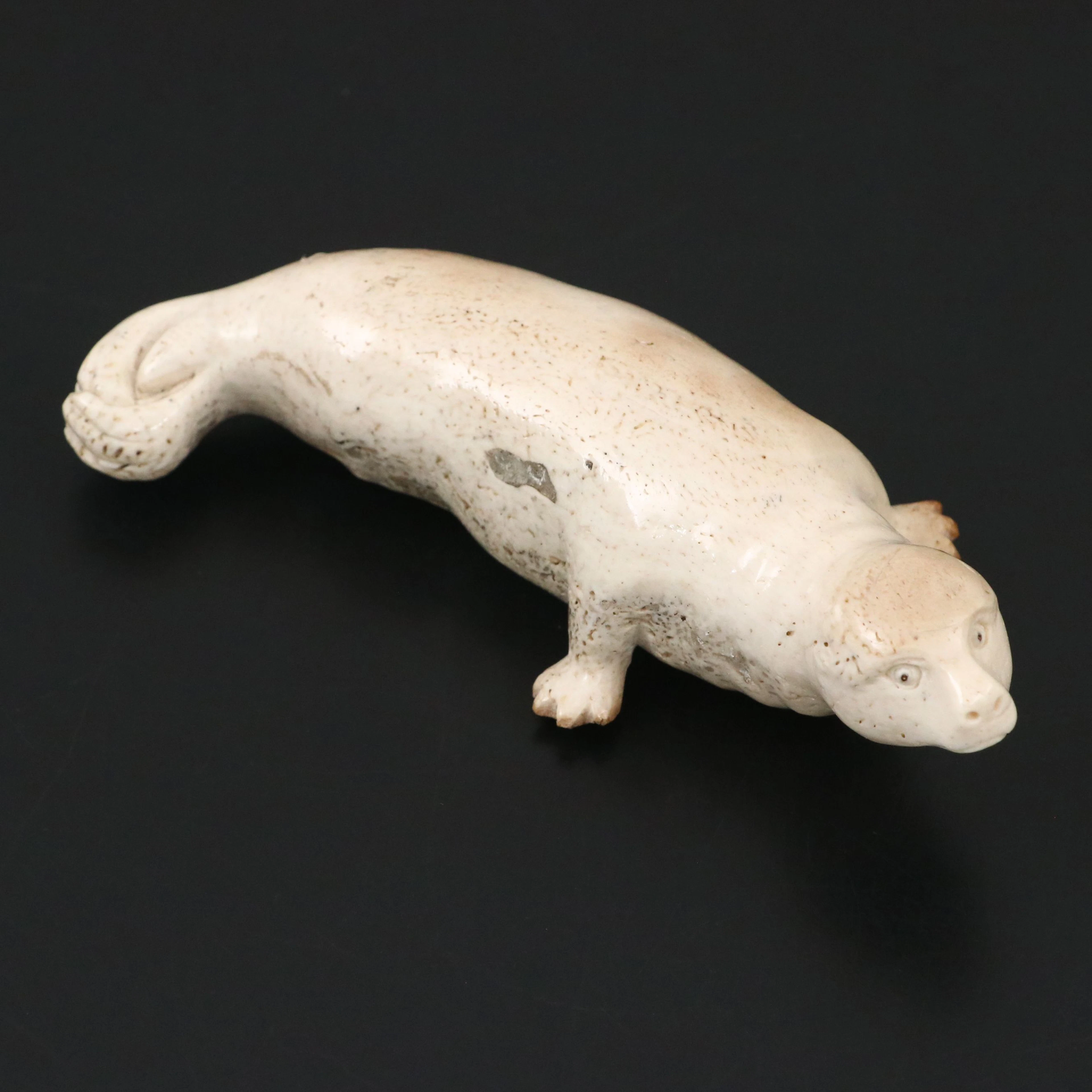 Antique Inuit Carved Fossilized Whalebone Seal