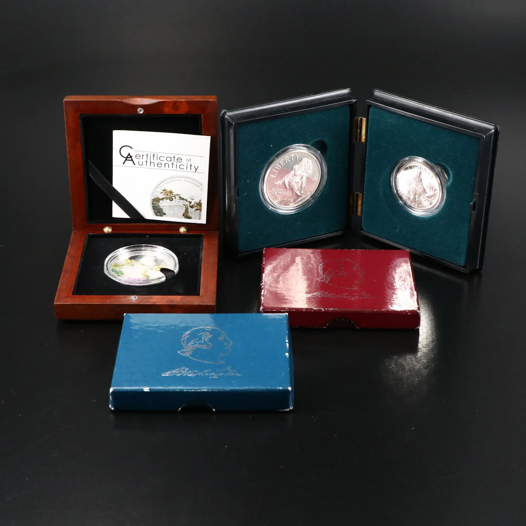 Three U.S. Commemorative Silver Coins and a $5 Silver Coin from Palau