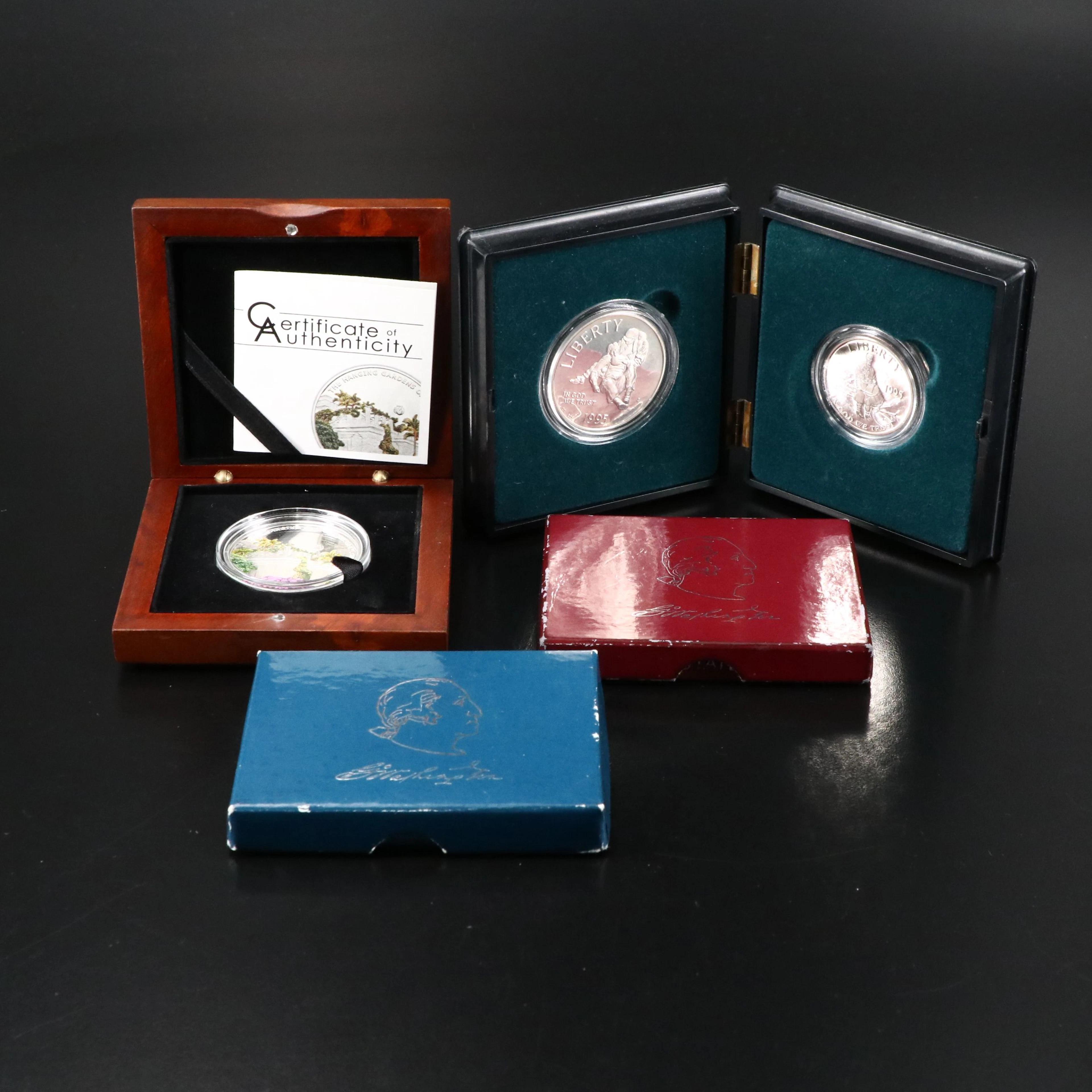 Three U.S. Commemorative Silver Coins and a $5 Silver Coin from Palau