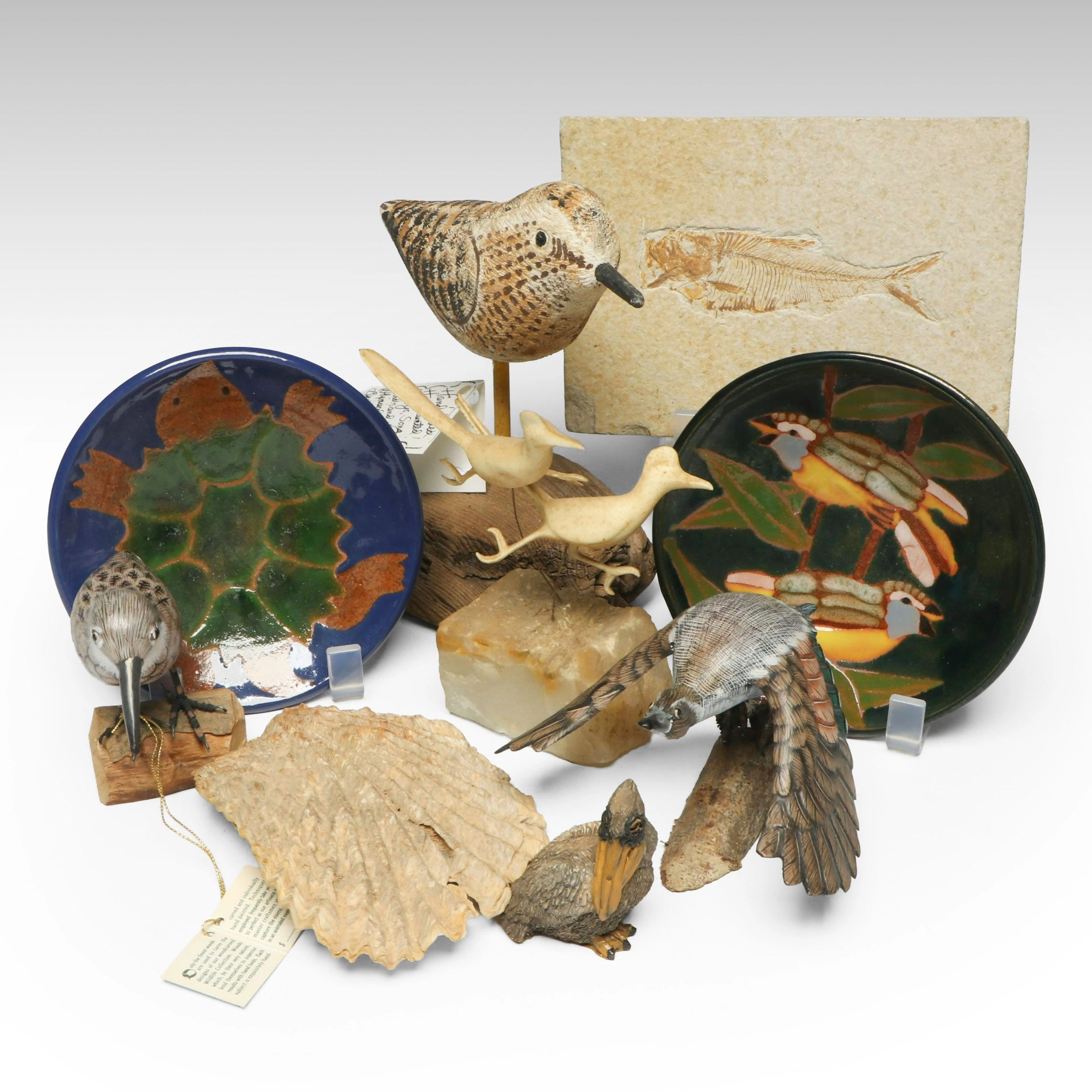 Fossilized Fish, Hand-Carved Birds, and Glazed Ceramic Animal Bowls