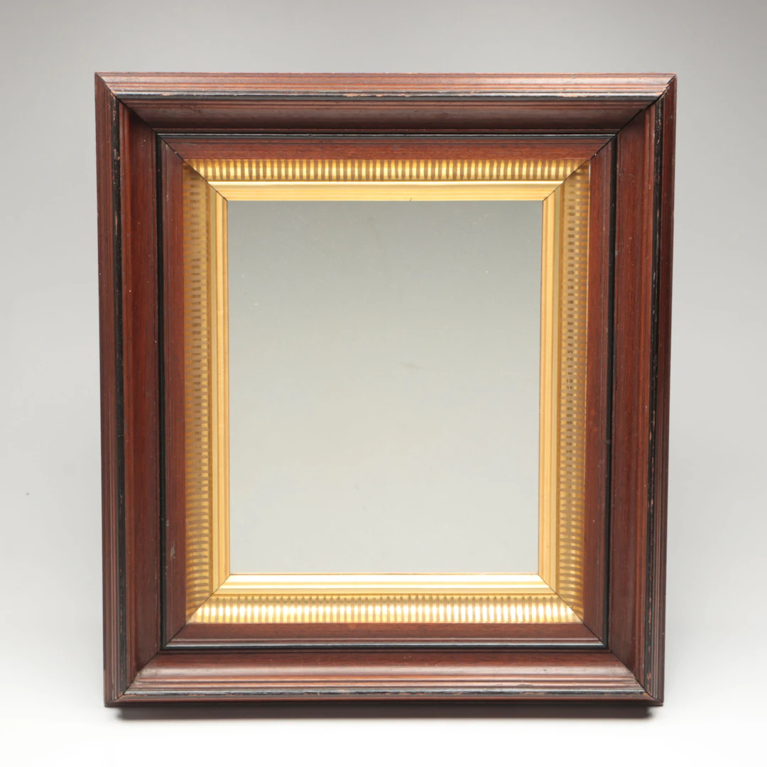 Victorian Walnut, Ebonized, and Parcel Gilt Mirror, Late 19th Century