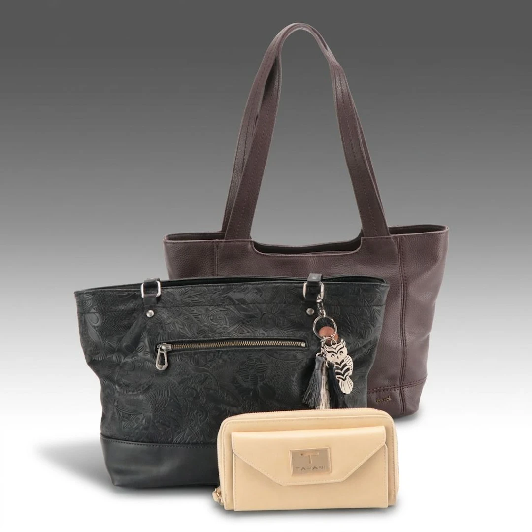 The Sak/Sakroots Shoulder Bags and T Tahari Organizer Wallet in Faux Leather