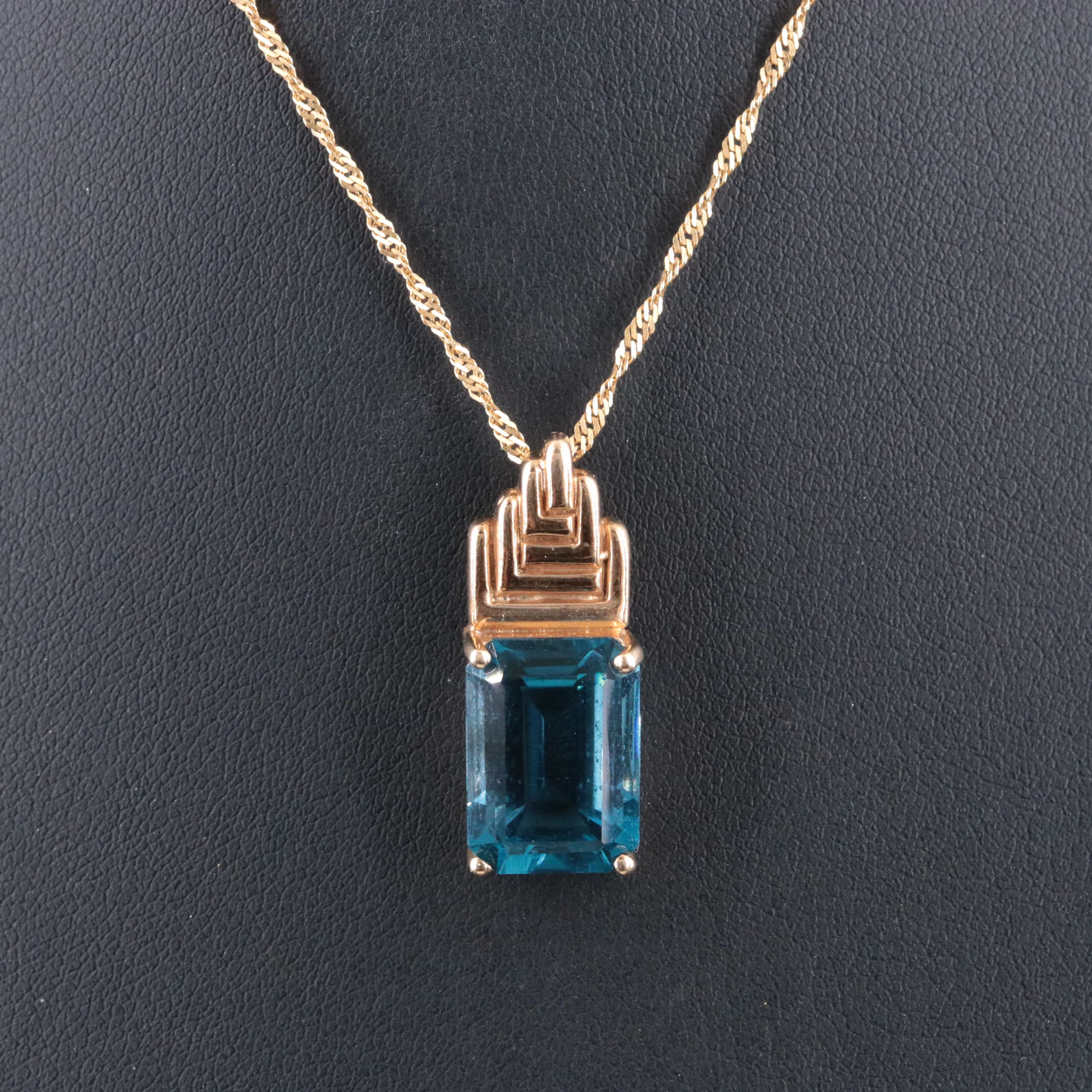 10K 9.50 CT Blue Topaz Pendant on 18K Singapore Chain Necklace