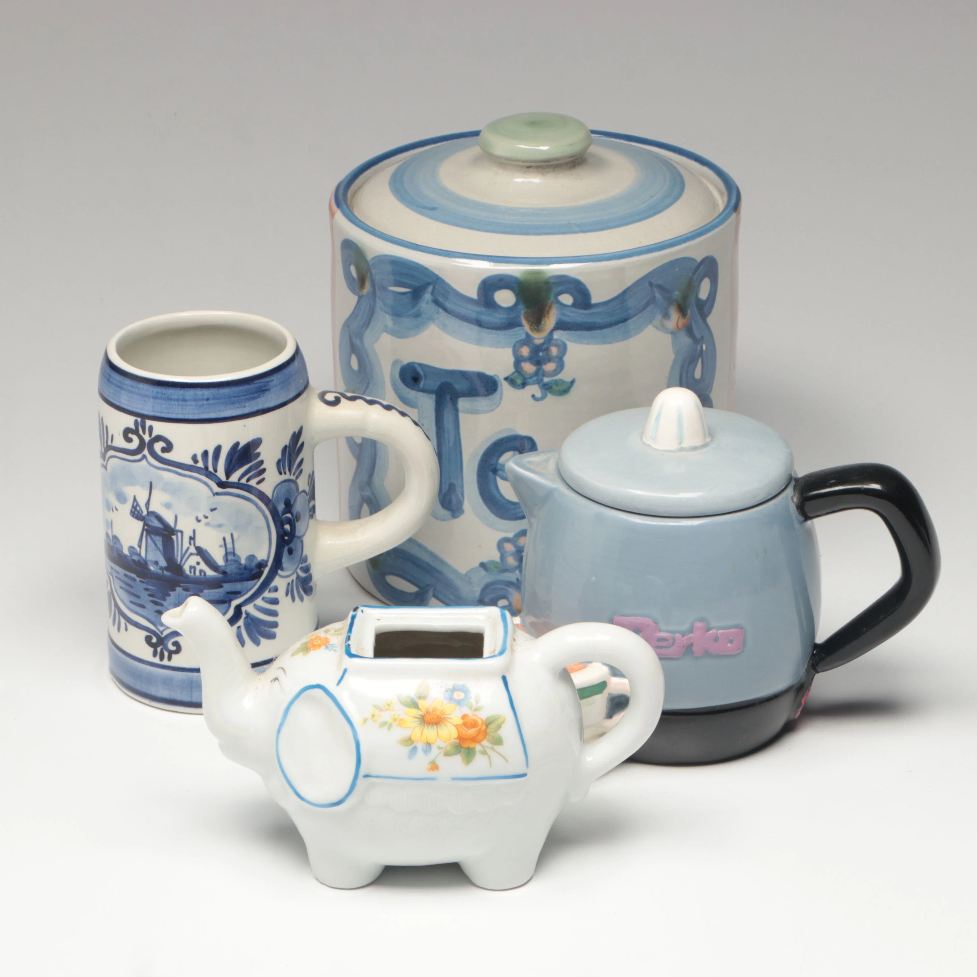 M. A. Hadley Pottery Tea Canister with Delft Blue Mug and Other Tableware