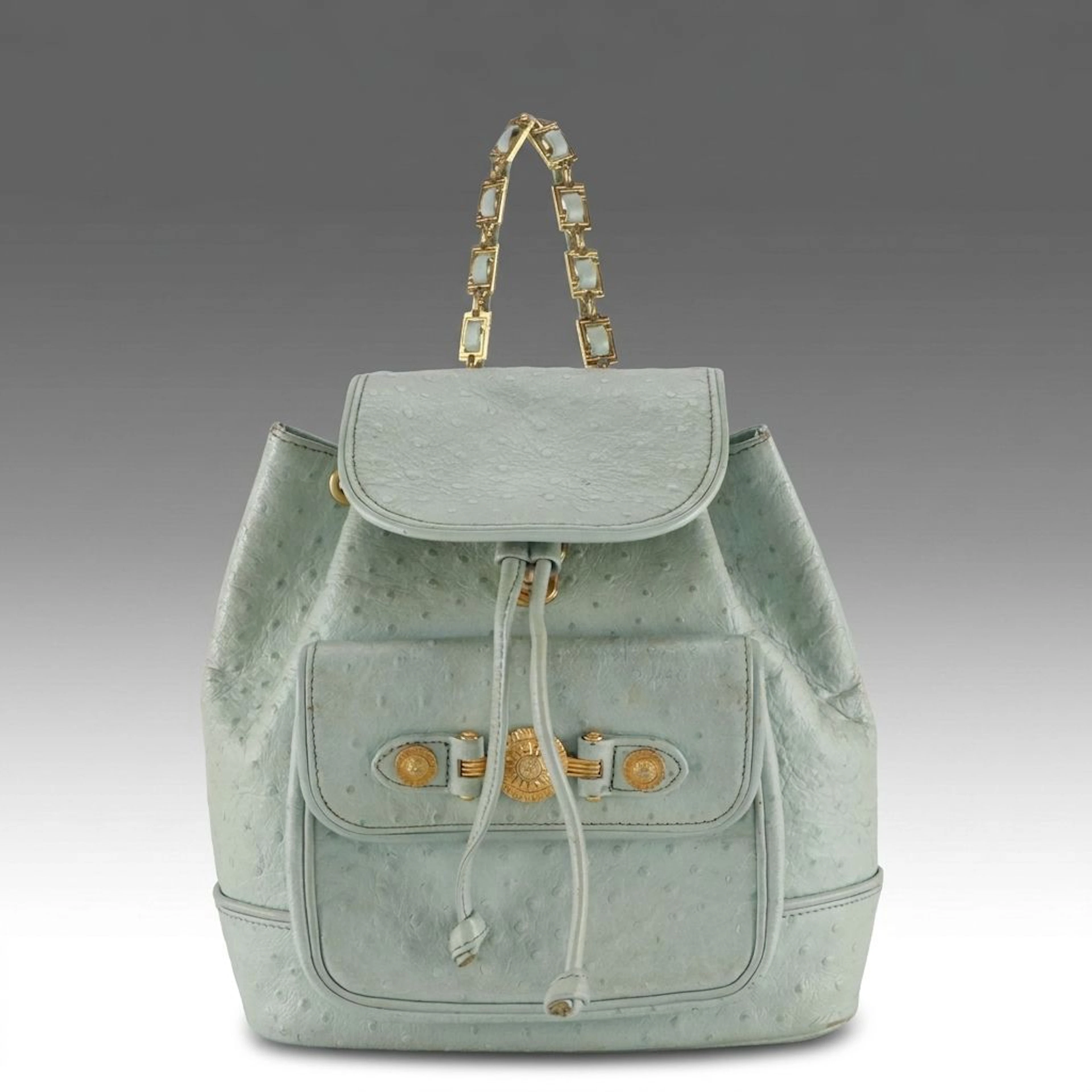 Gianni Versace Small Drawstring Backpack in Pastel Blue Embossed Ostrich