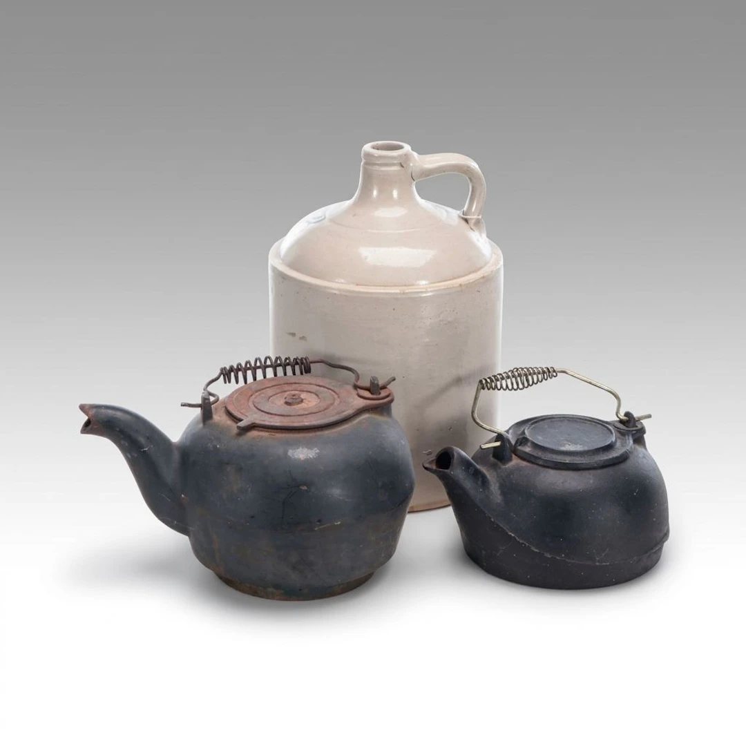 Stoneware Three-Gallon Jug with Cast Iron Kettles, Late 19th/Early 20th Century