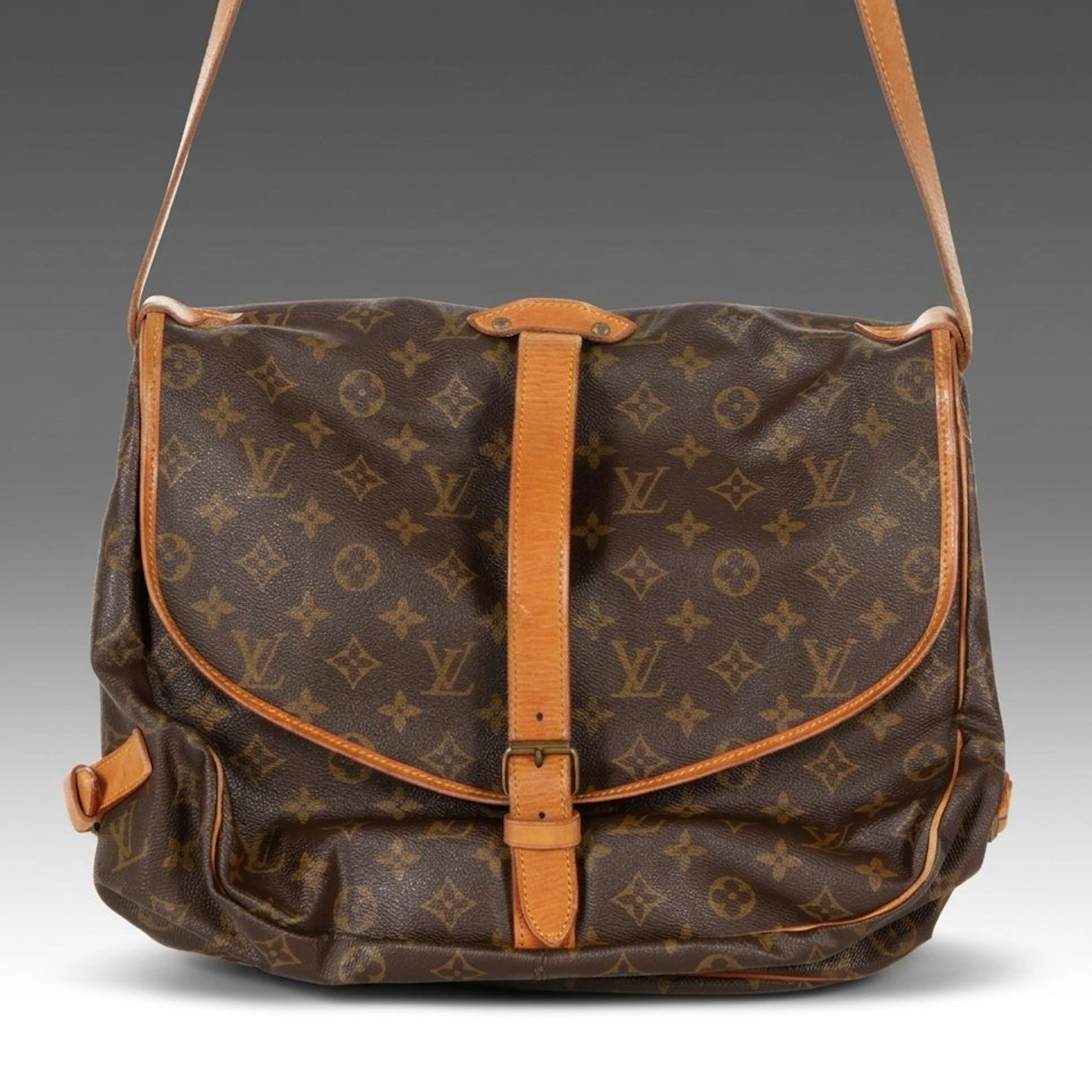 Louis Vuitton Saumur 35 Messenger Bag in Monogram Canvas and Vachetta Leather
