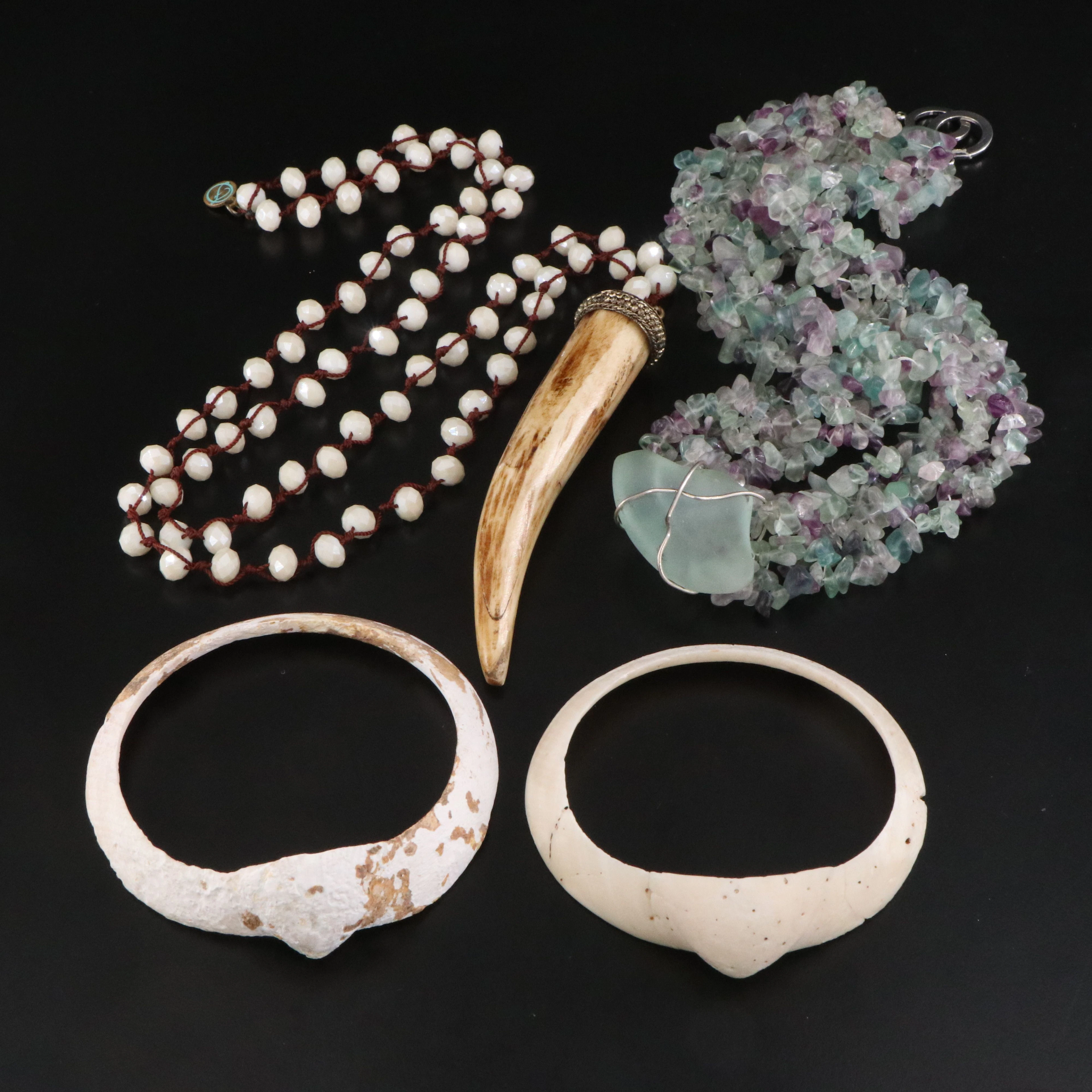 Fabulina Carved Bone Fang & Fluorite Necklaces with Shell Bangles