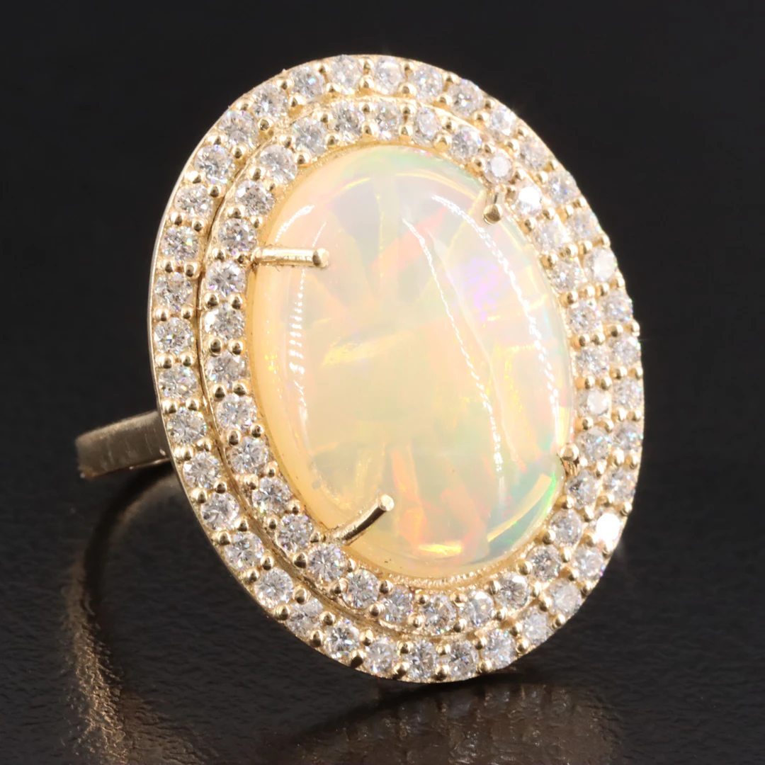 14K 5.96 CT Opal and 1.12 CTW Diamond Ring