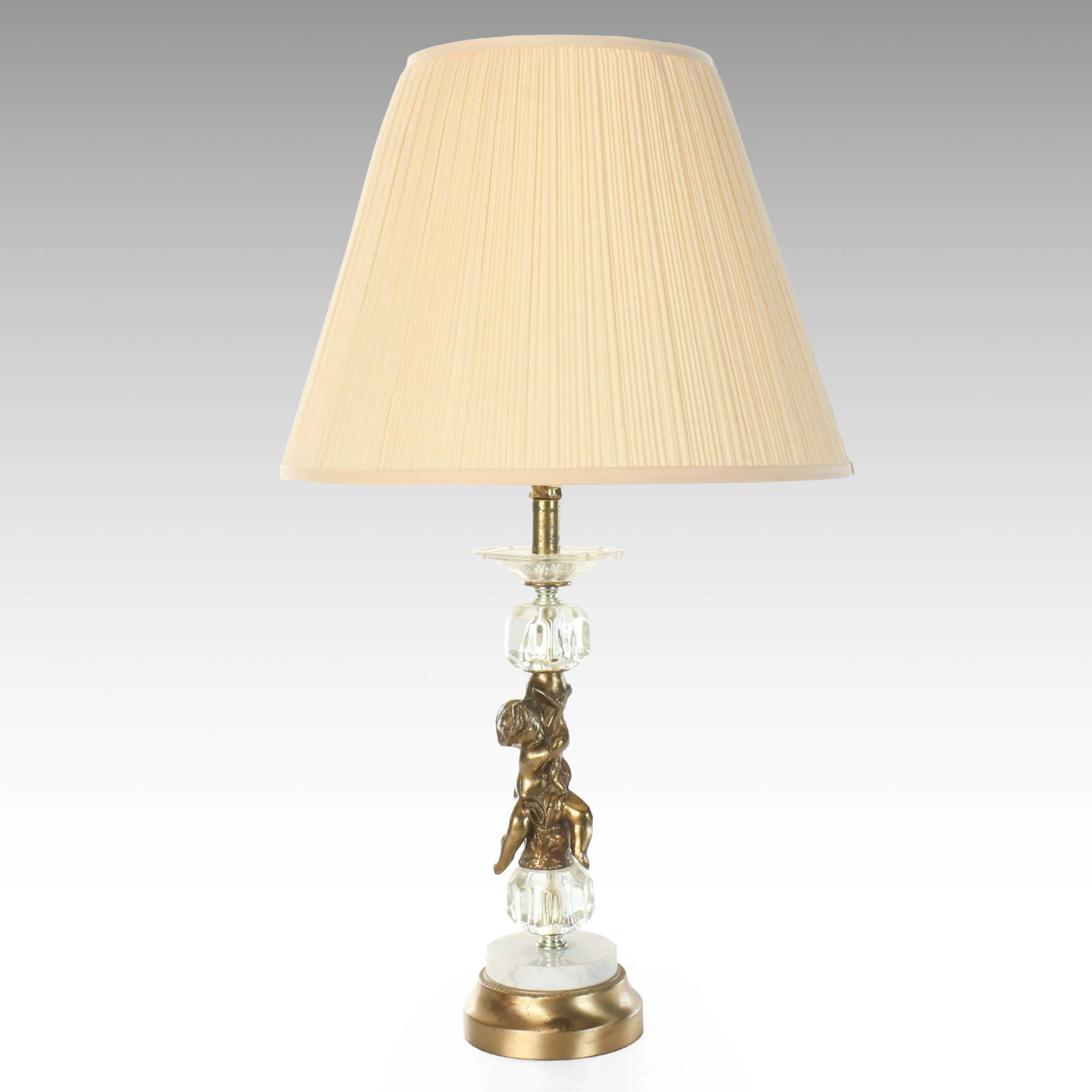 Hollywood Regency Gilt Metal and Glass Putto Table Lamp