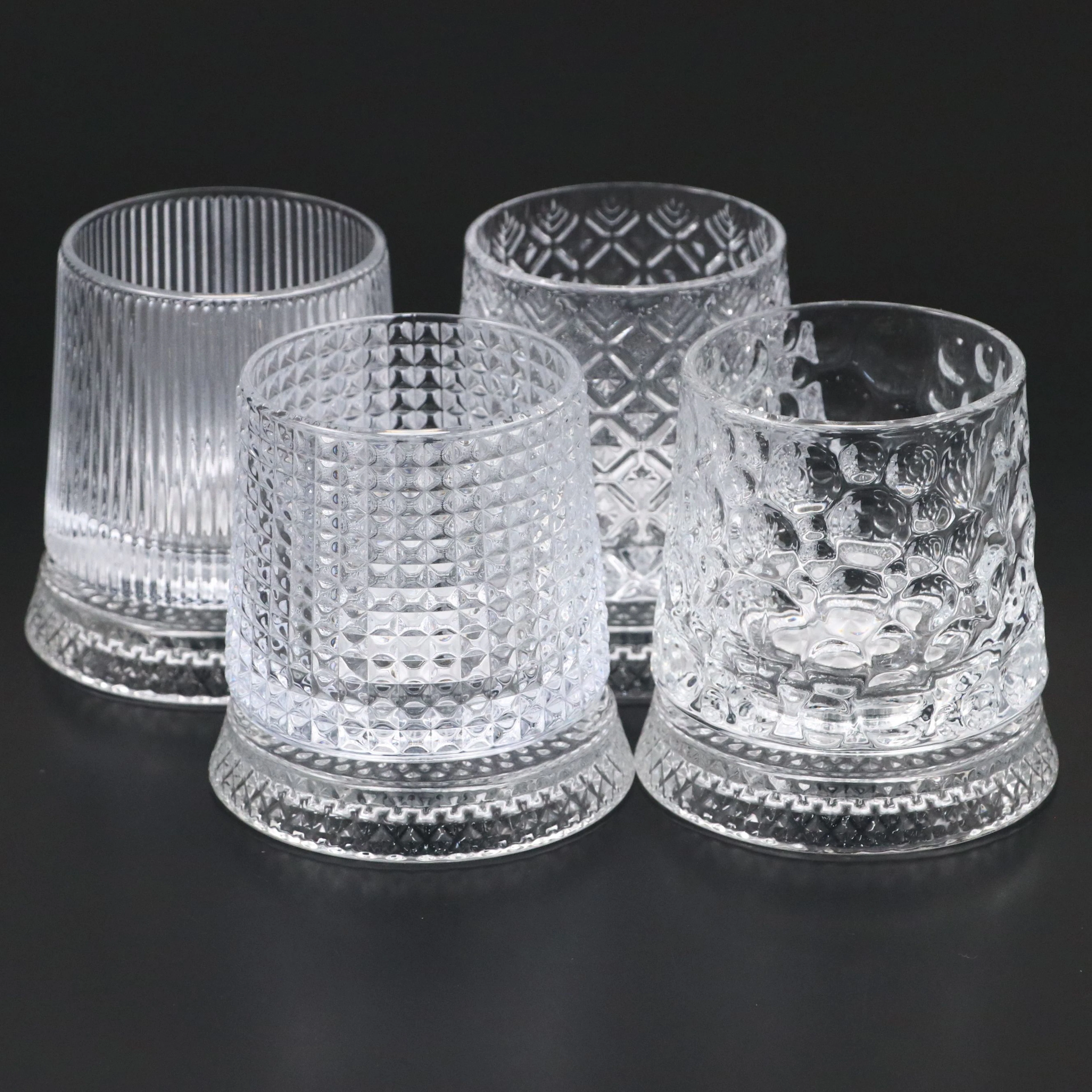 Christian Dior Rotating Old Fashioned Glass and Coaster Set, 21st Century