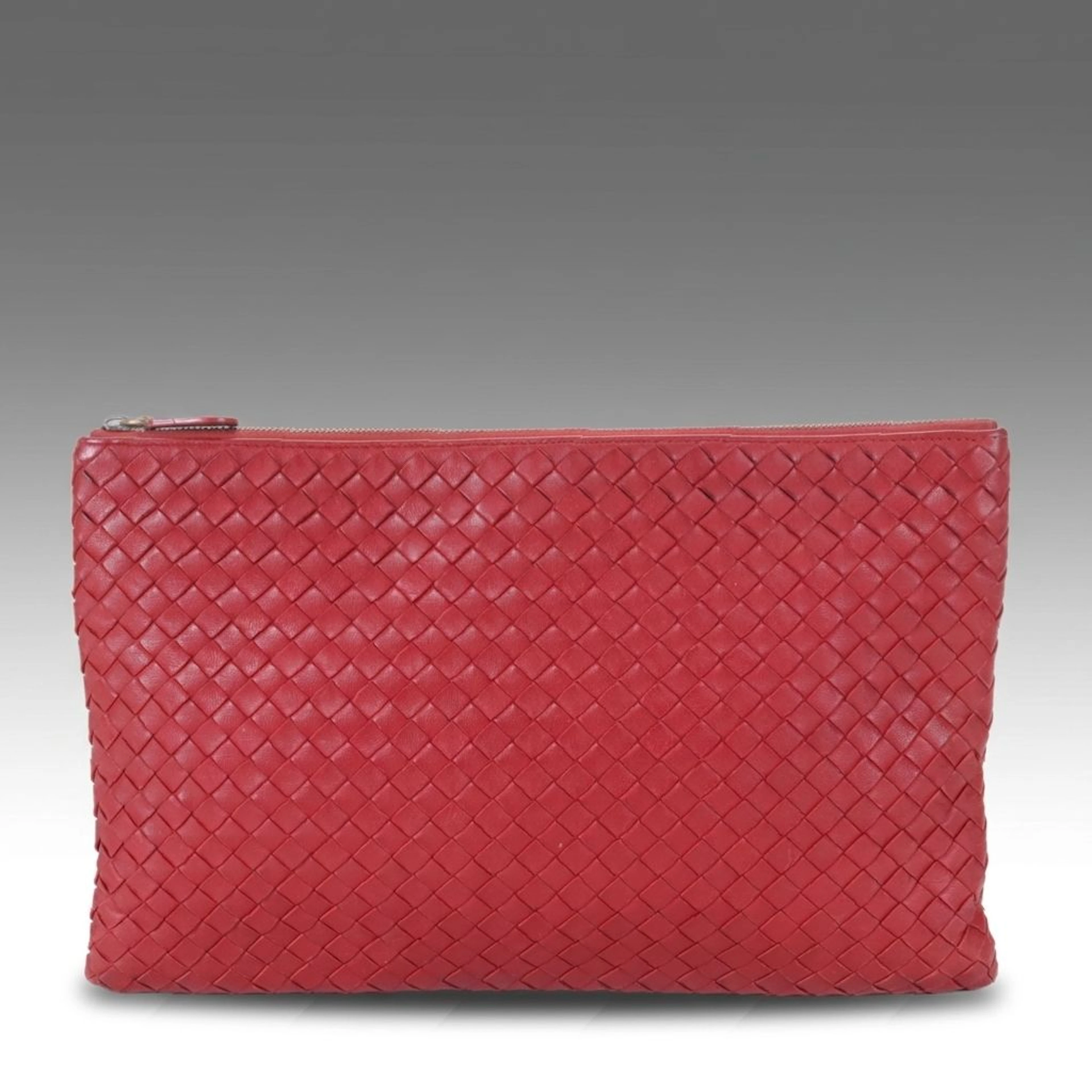 Bottega Veneta Zippered Clutch Bag in Merlot Red Intrecciato Leather Clutch
