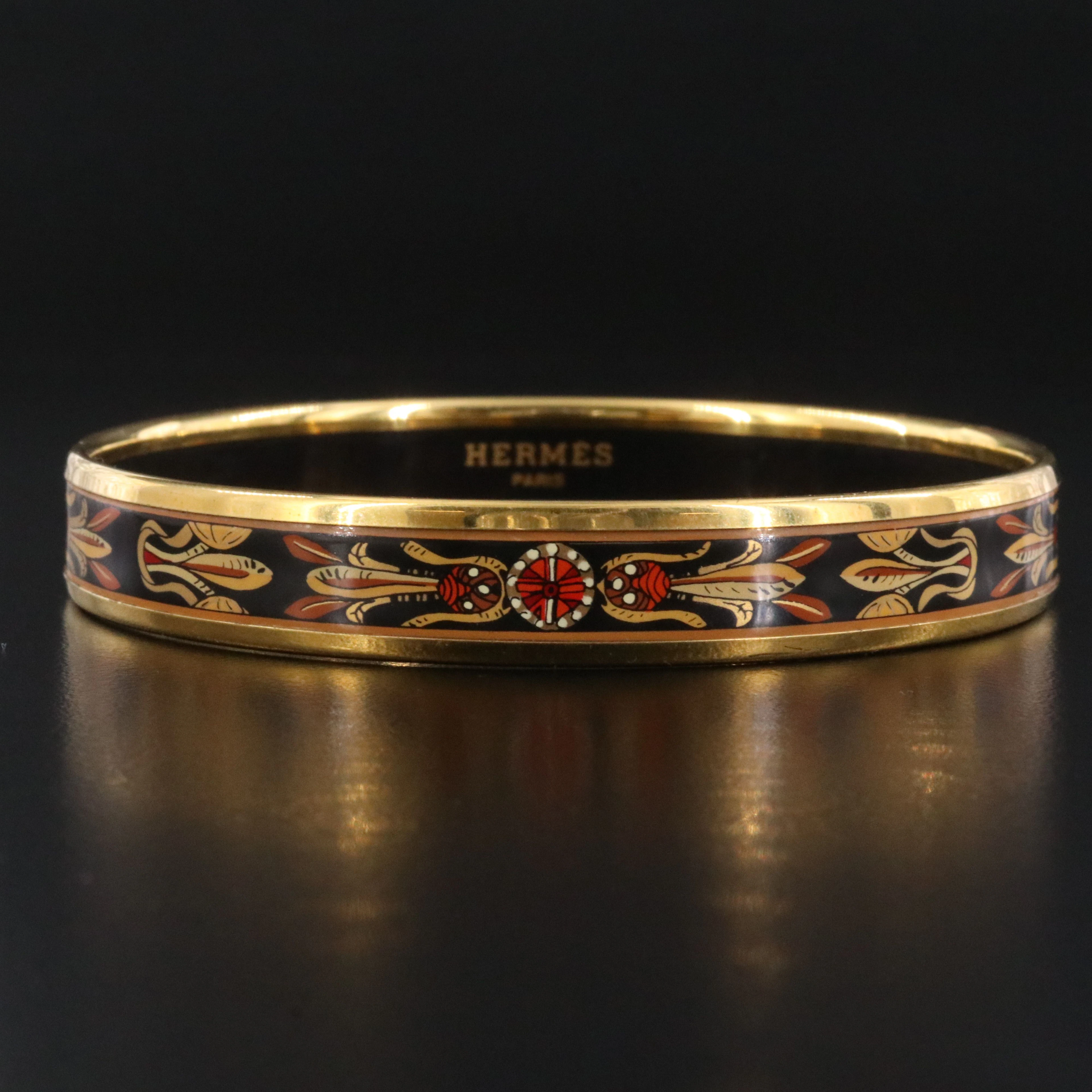 Hermès Black and Gold Motif Narrow Enamel Bangle