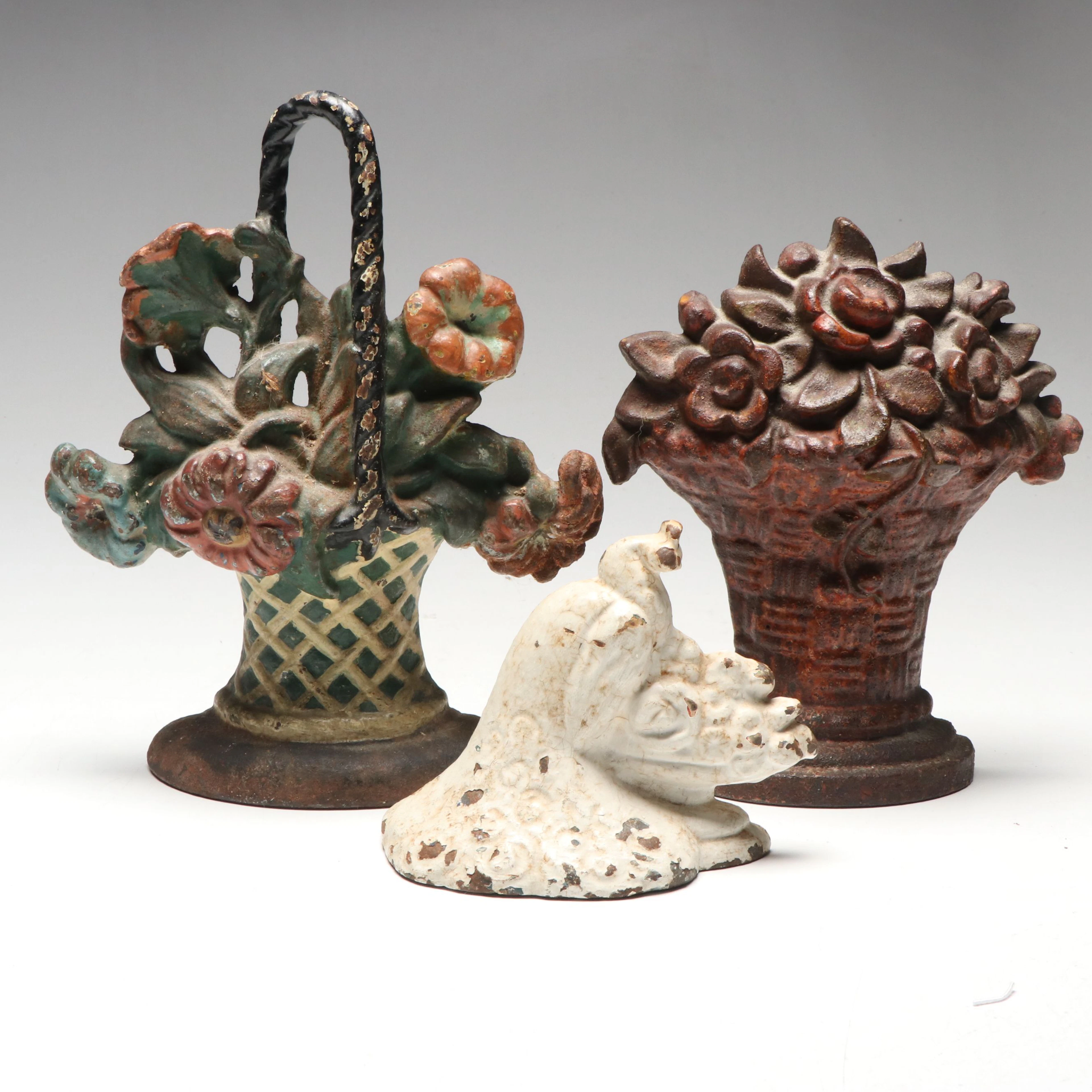 Floral Bouquet and Peacock Cast Iron Doorstops