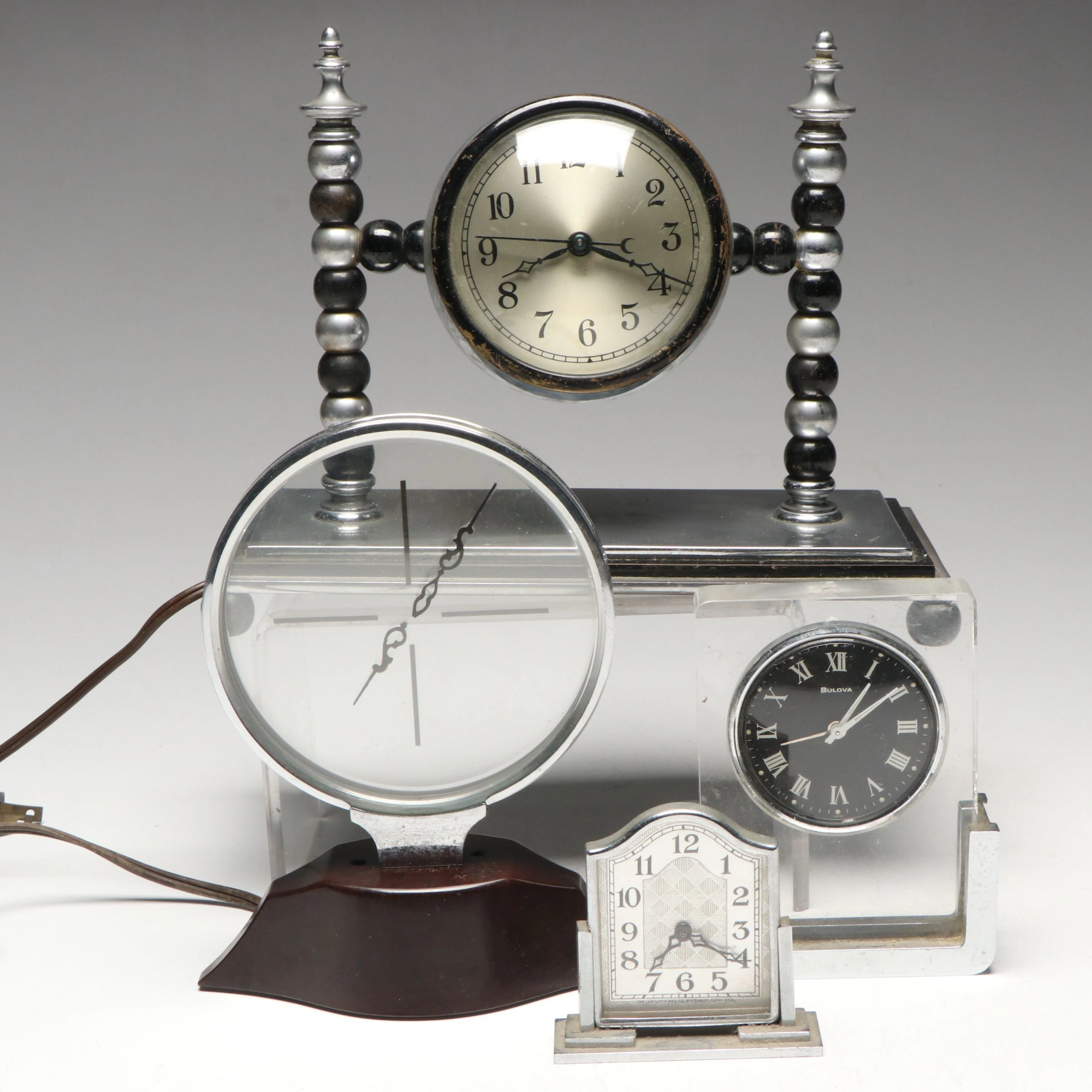 Rex Cole Mystery Clock with More Art Deco and Modernist Style Desk Clocks