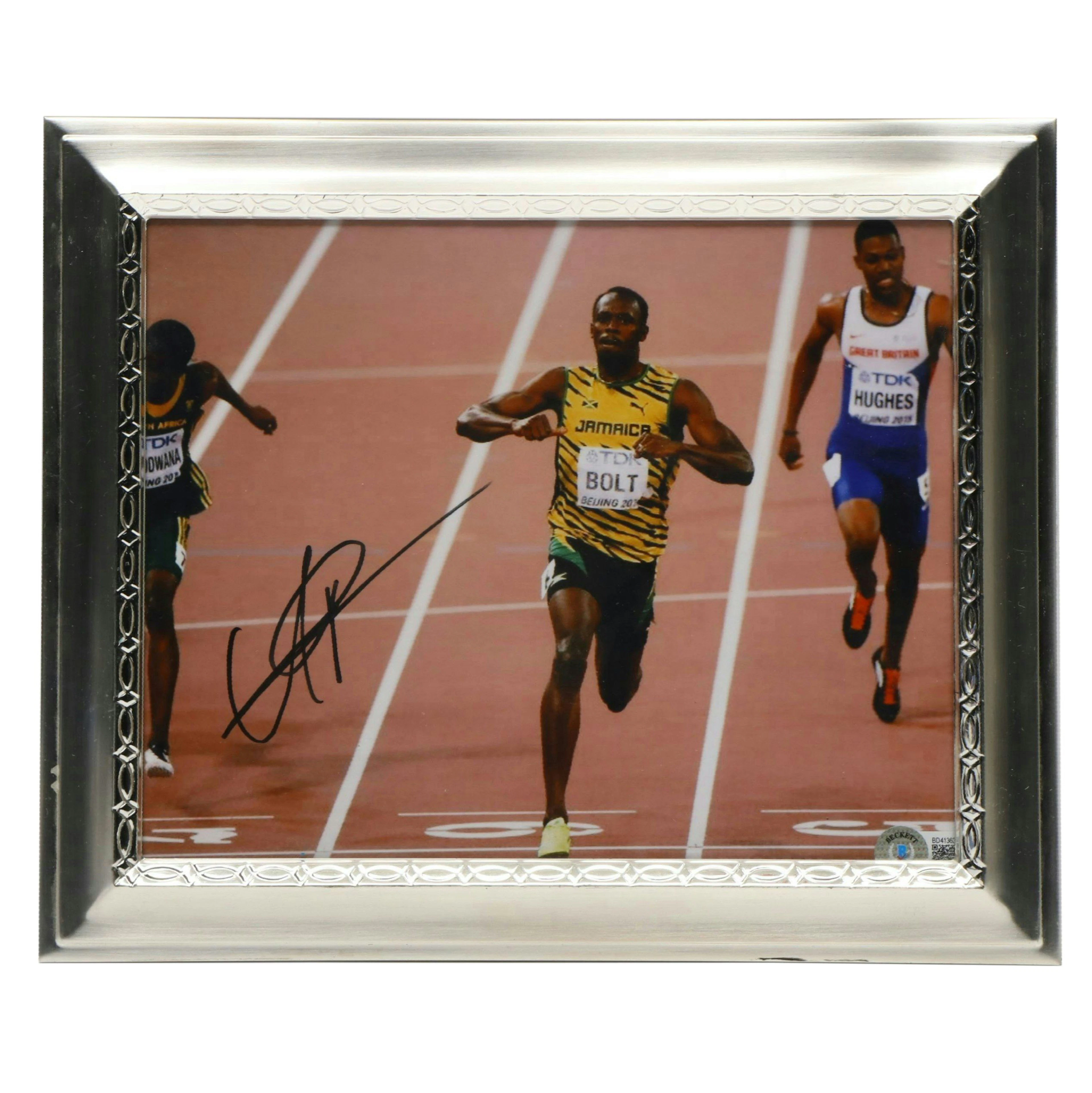 Usain Bolt Signed Photograph in Frame, Beckett