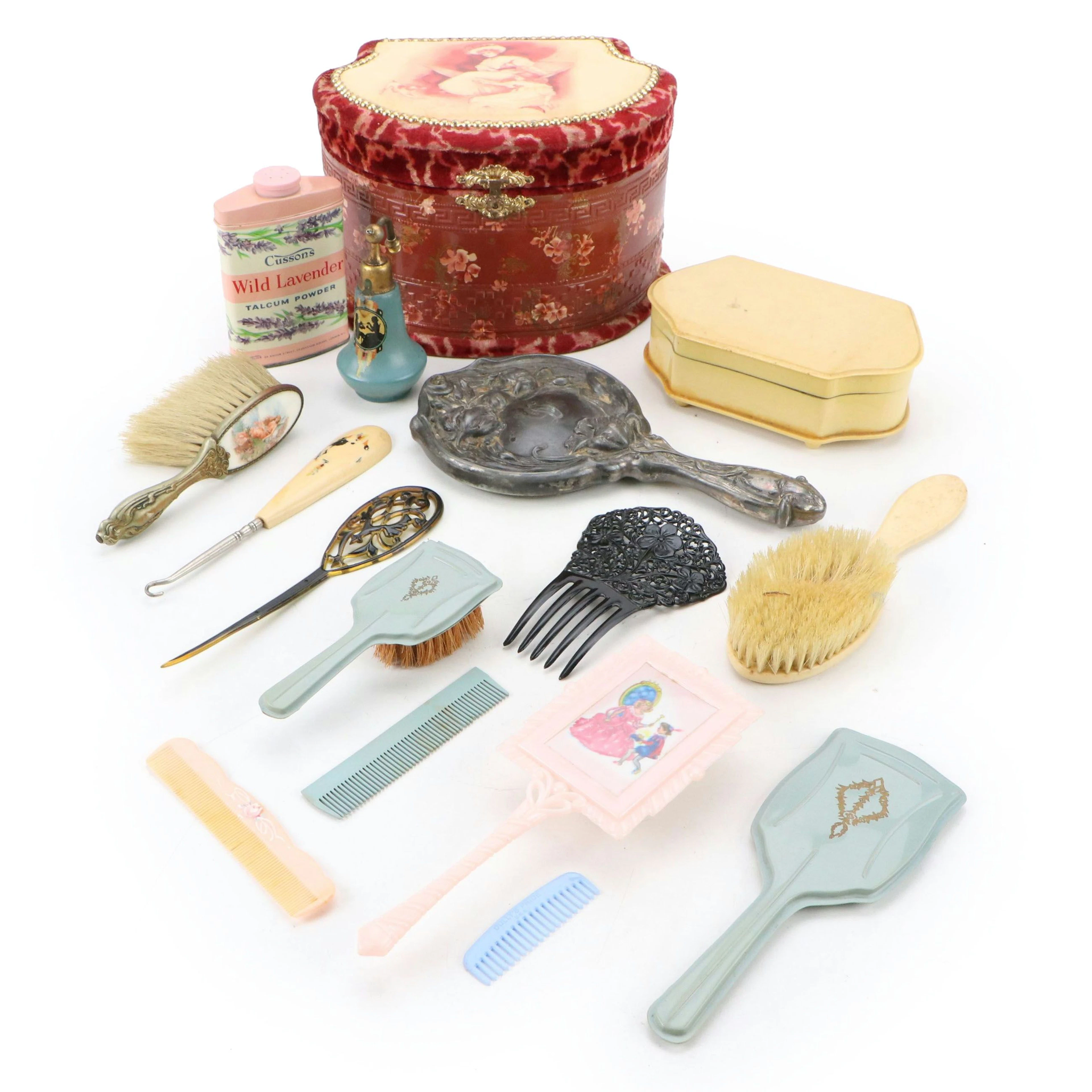 Silver Plate Hand Mirror, Celluloid Button Hook, and More Vintage Vanity Décor