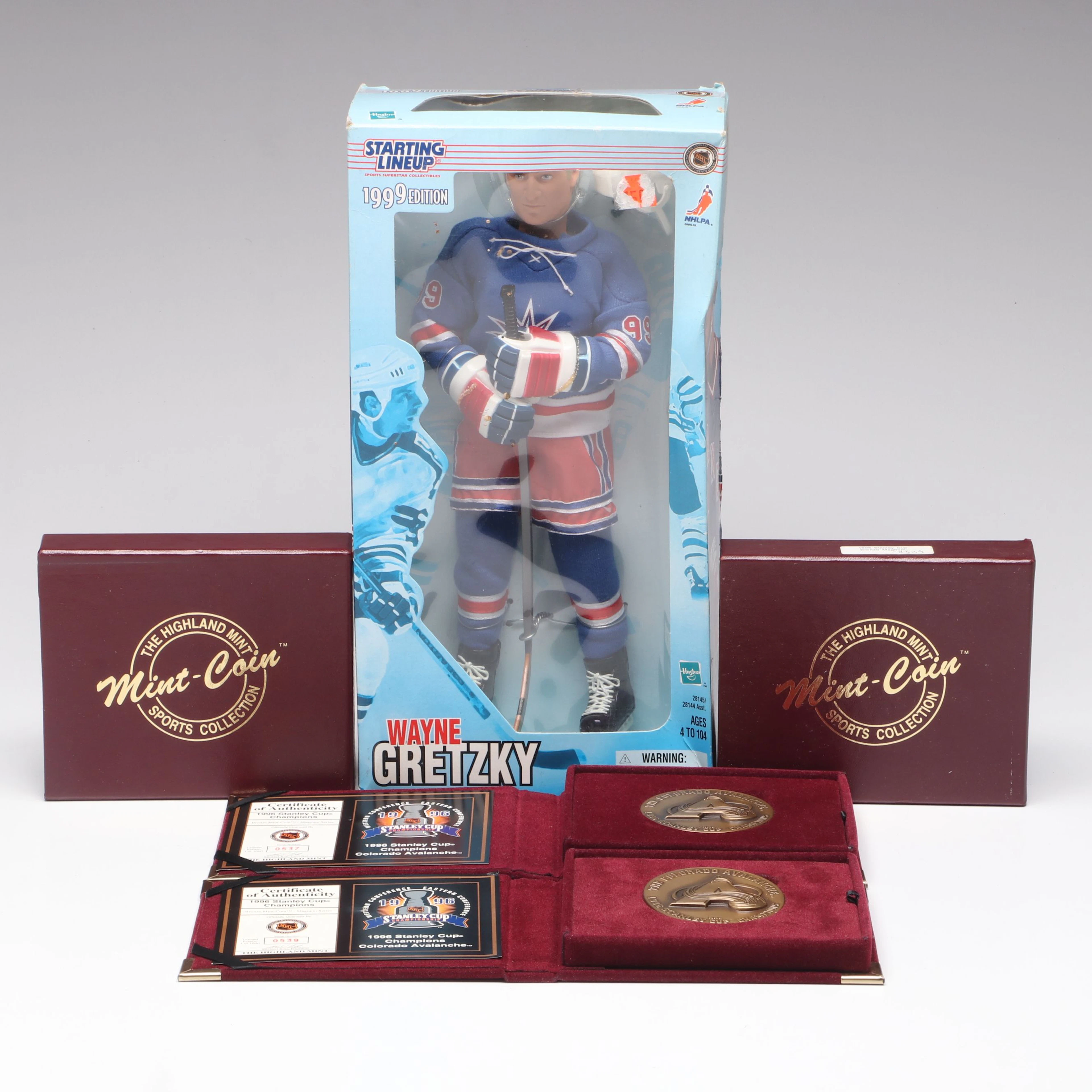 The Highland Mint Hockey Coins with Wayne Gretzky Starling Lineup Action Figure