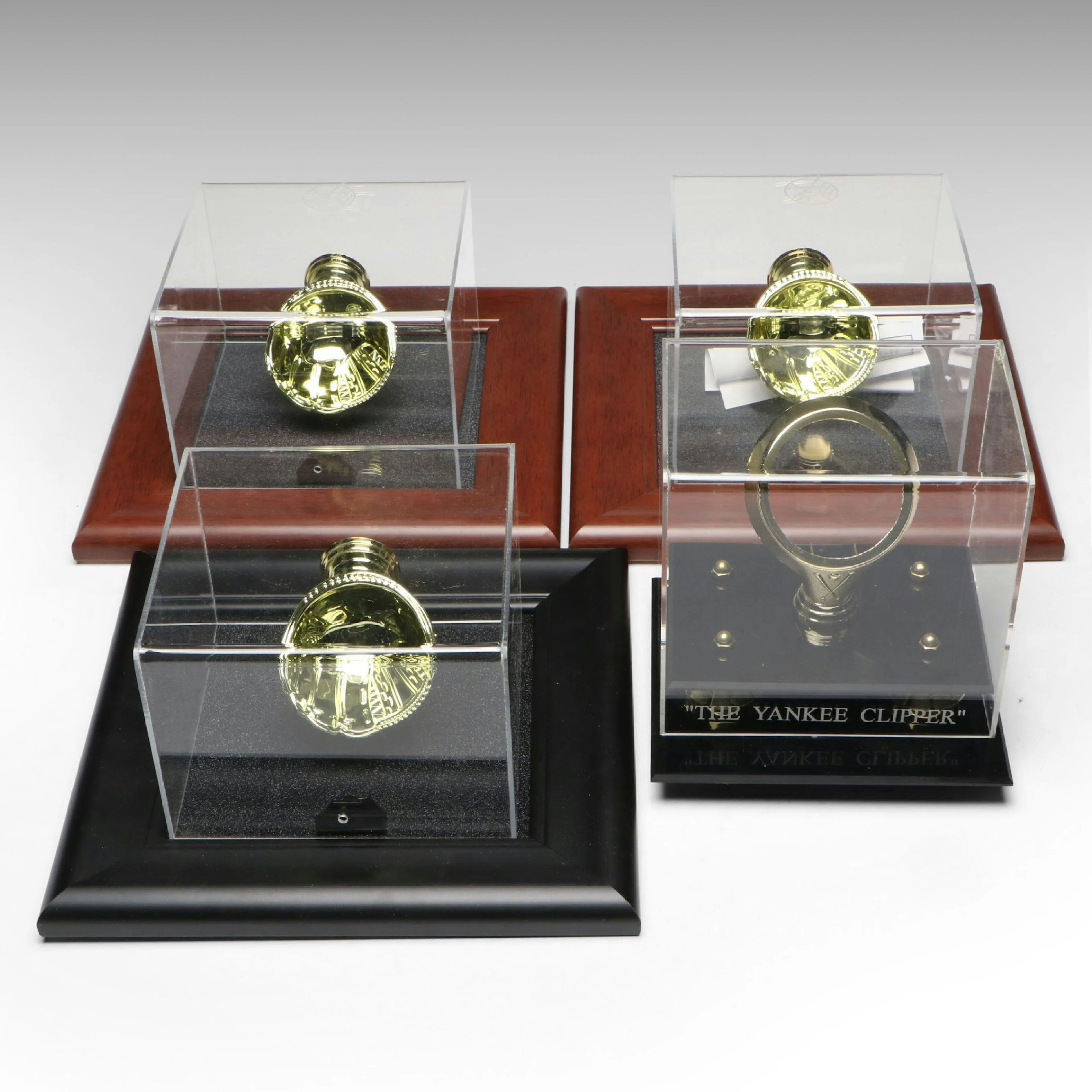 Joe DiMaggio "The Yankee Clipper" with Other Baseball Glove Ball Displays