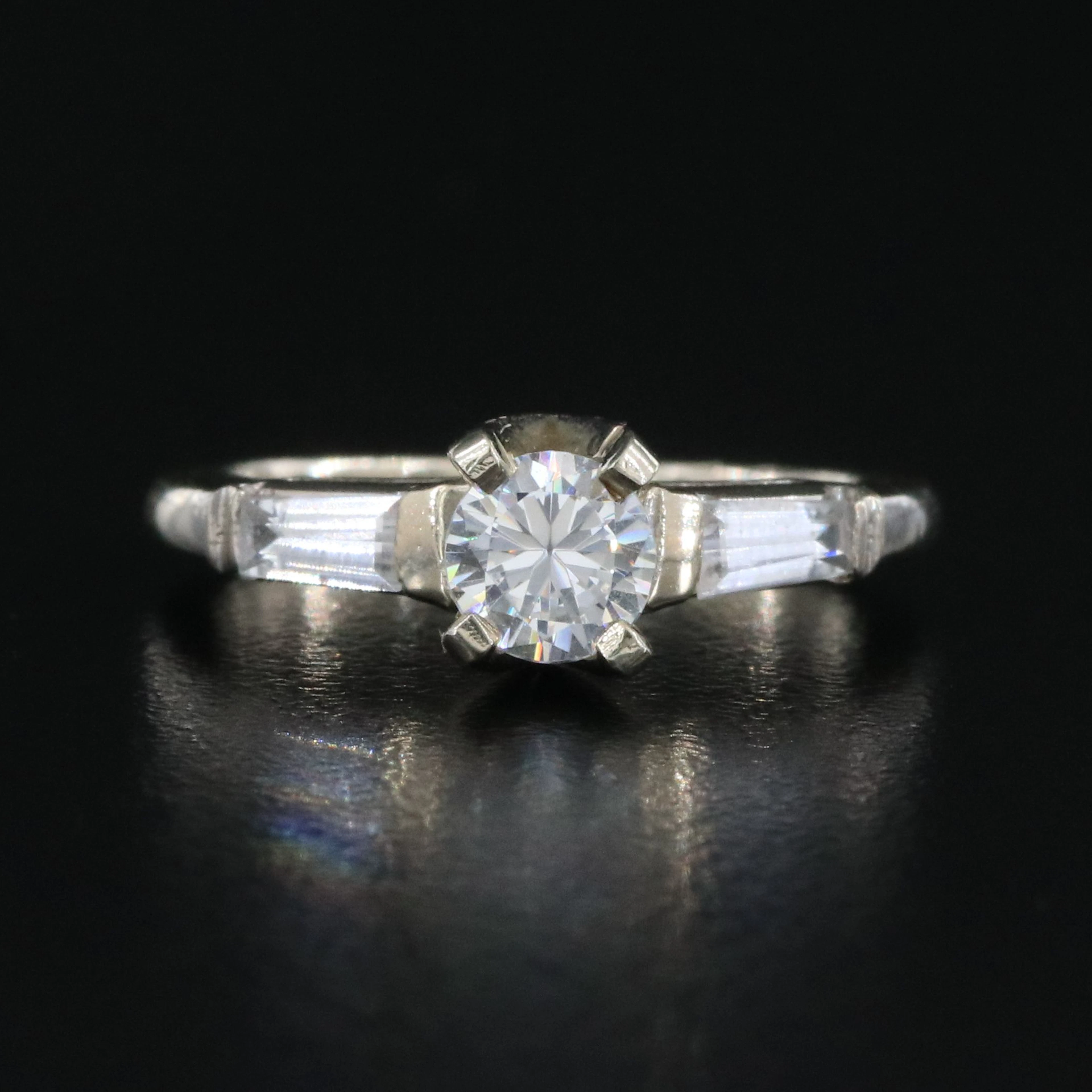 14K Strontium Titanate and White Spinel Ring