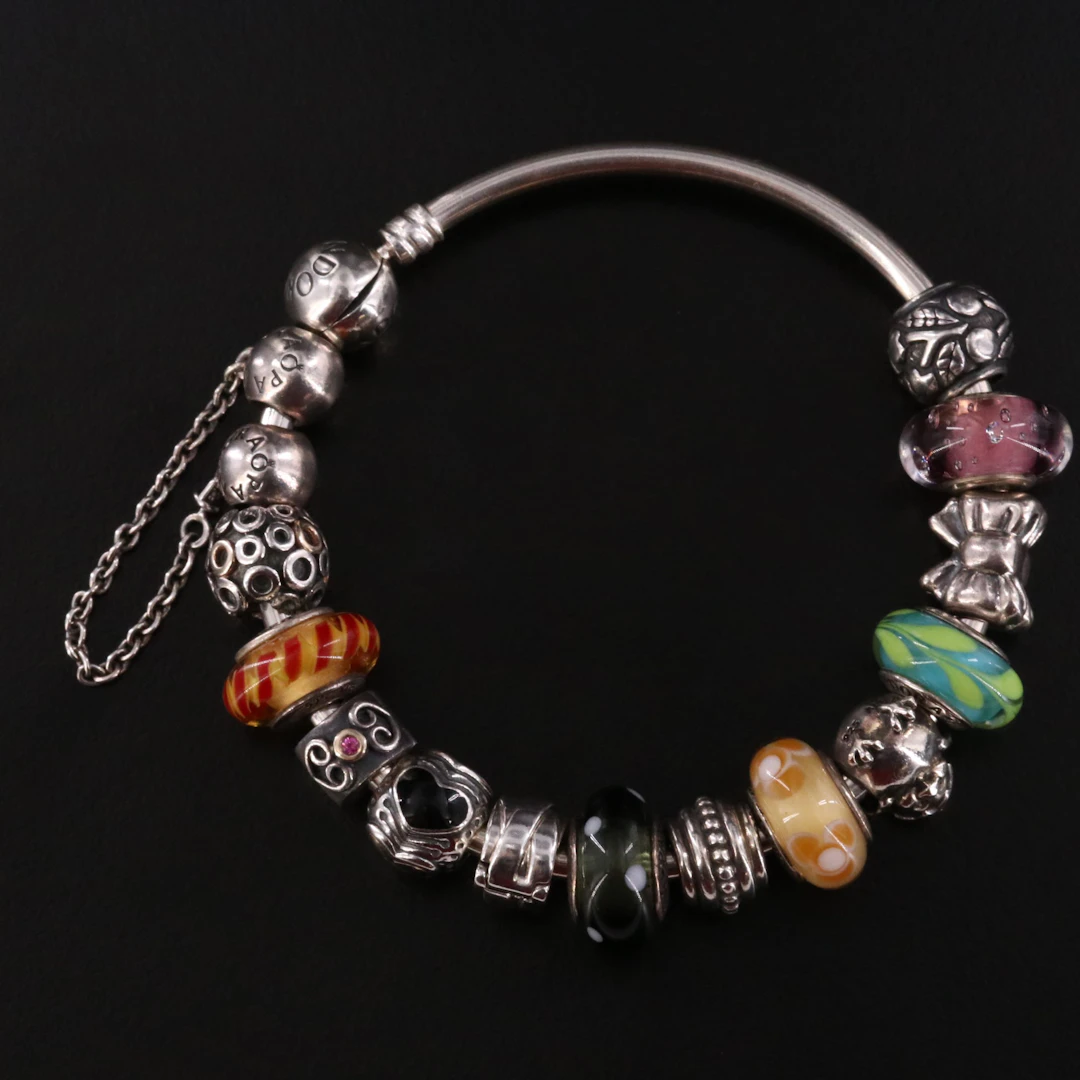 Pandora Sterling Bracelet with Glass, Enamel, and Ruby Bead Charms