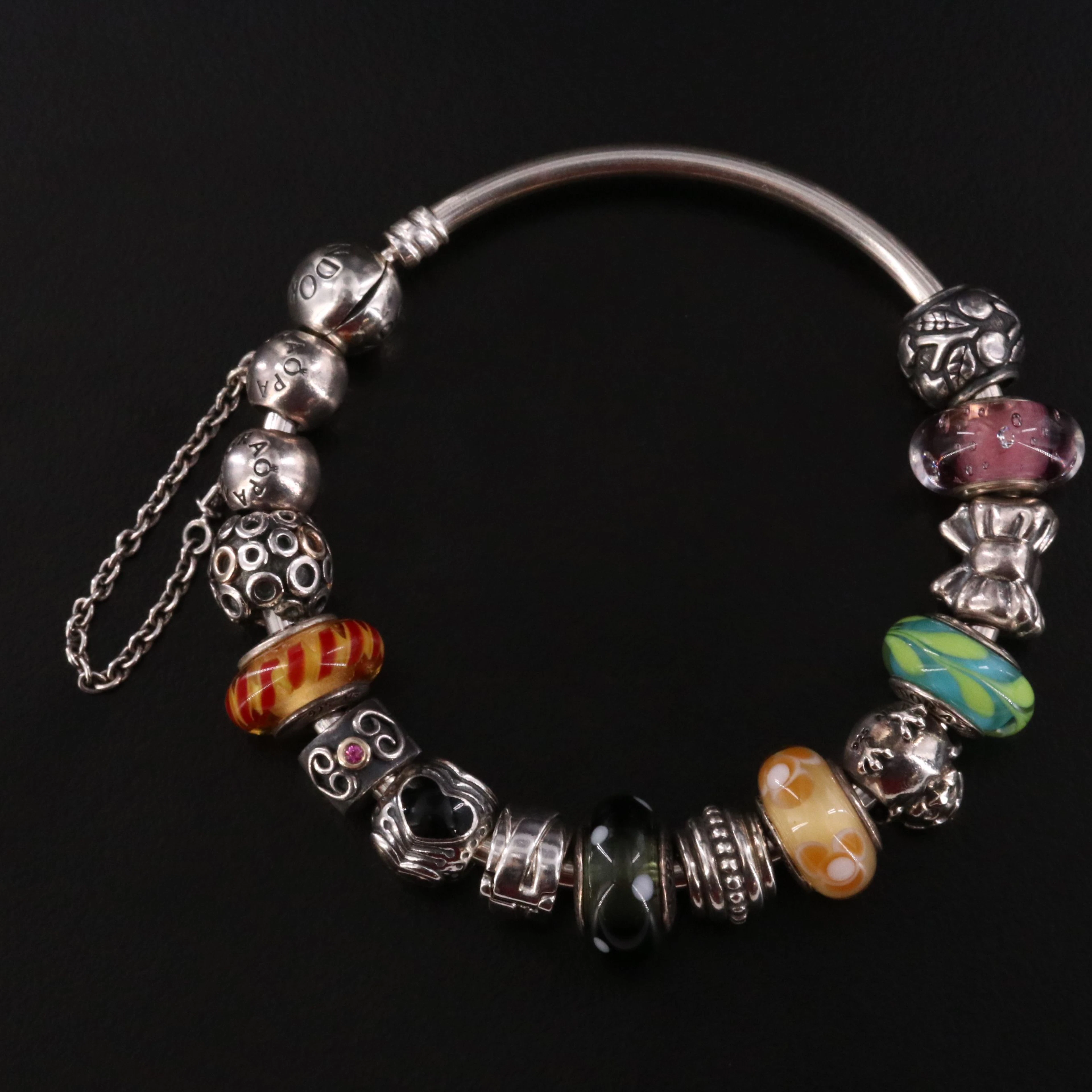 Pandora Sterling Bracelet with Glass, Enamel, and Ruby Bead Charms
