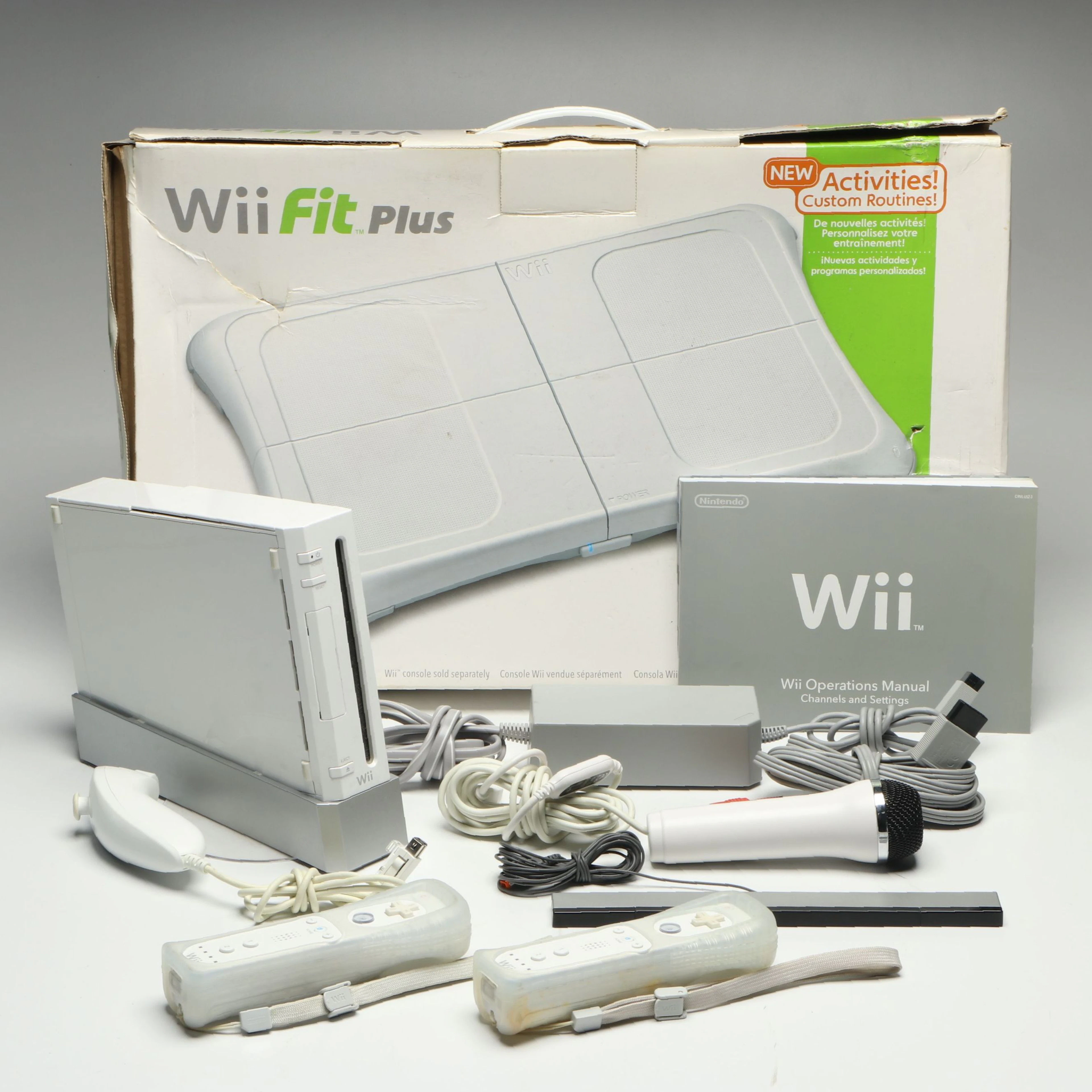 Nintendo Wii with Wii Fit Plus Board, Nunchuk and More Accessories