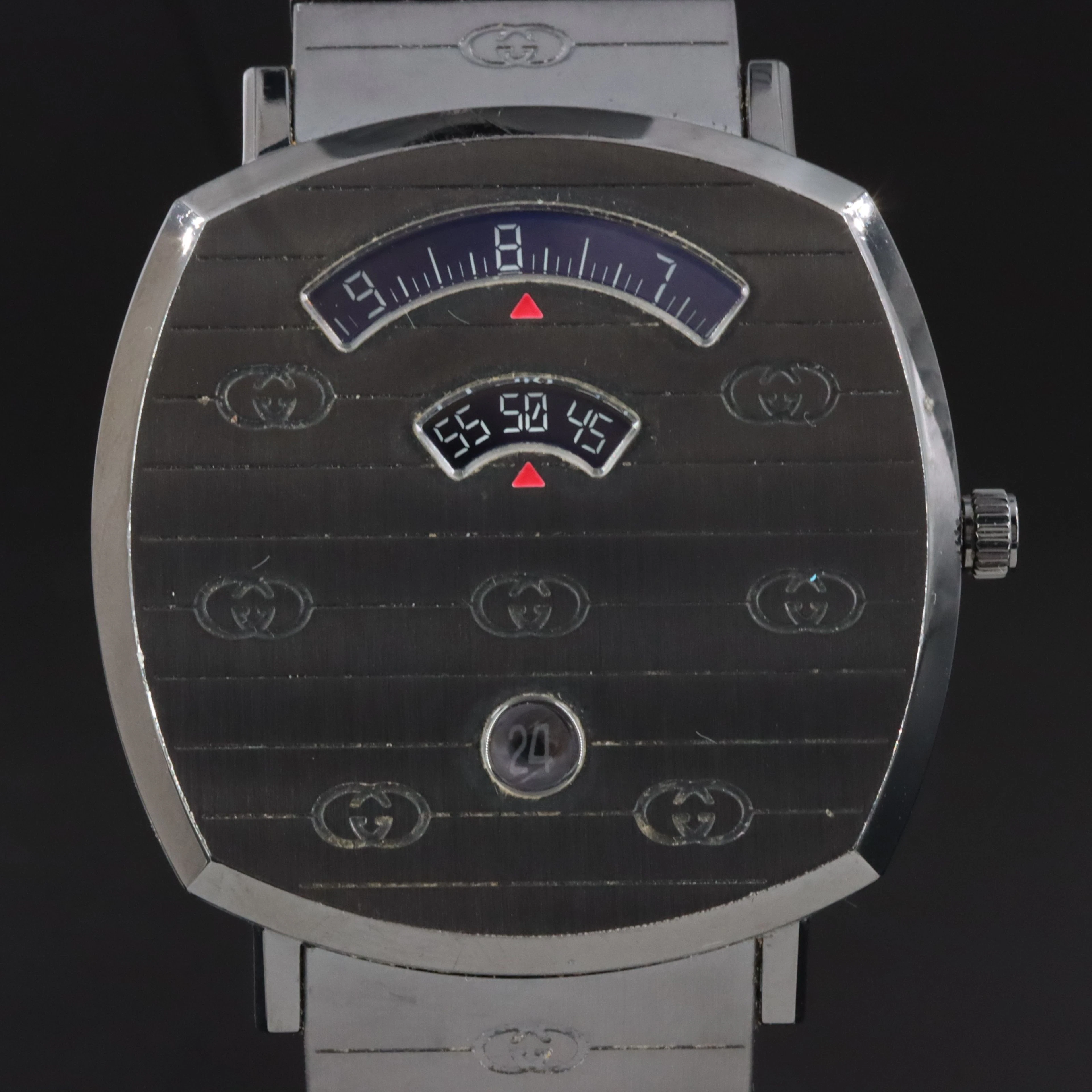 Gucci Grip Stainless Steel and Ion Swiss Quartz Watch Model # 157.3