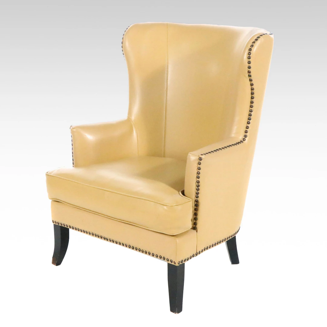 Contemporary Yellow Leatherette Wingback Chair with Nailhead Trim