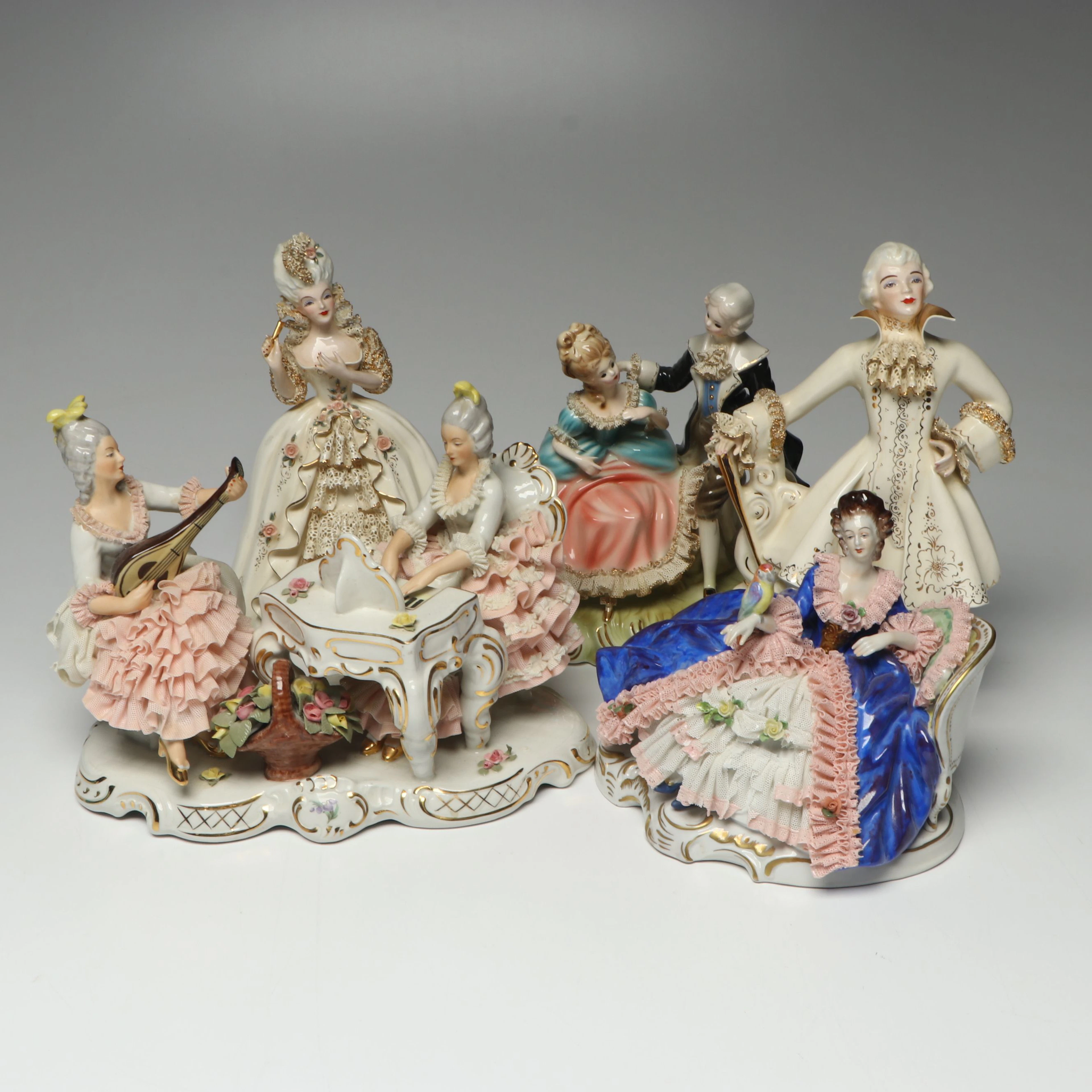 Volkstedt and Sandizell Dresden Lace with Other Porcelain Figurines, 20th C.