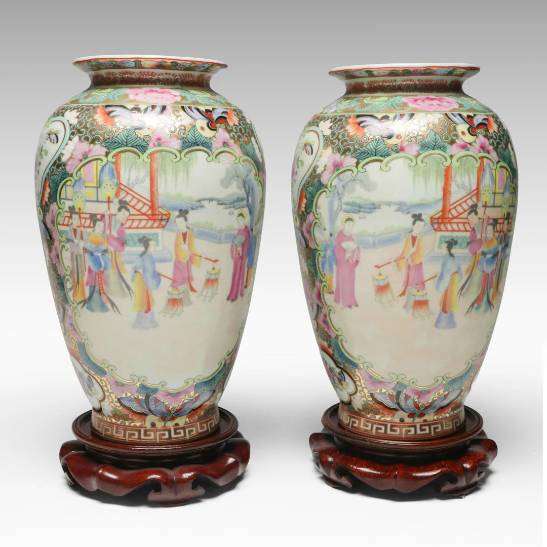 Chinese Famille Rose Porcelain Vase Pair with Carved Wood Stands