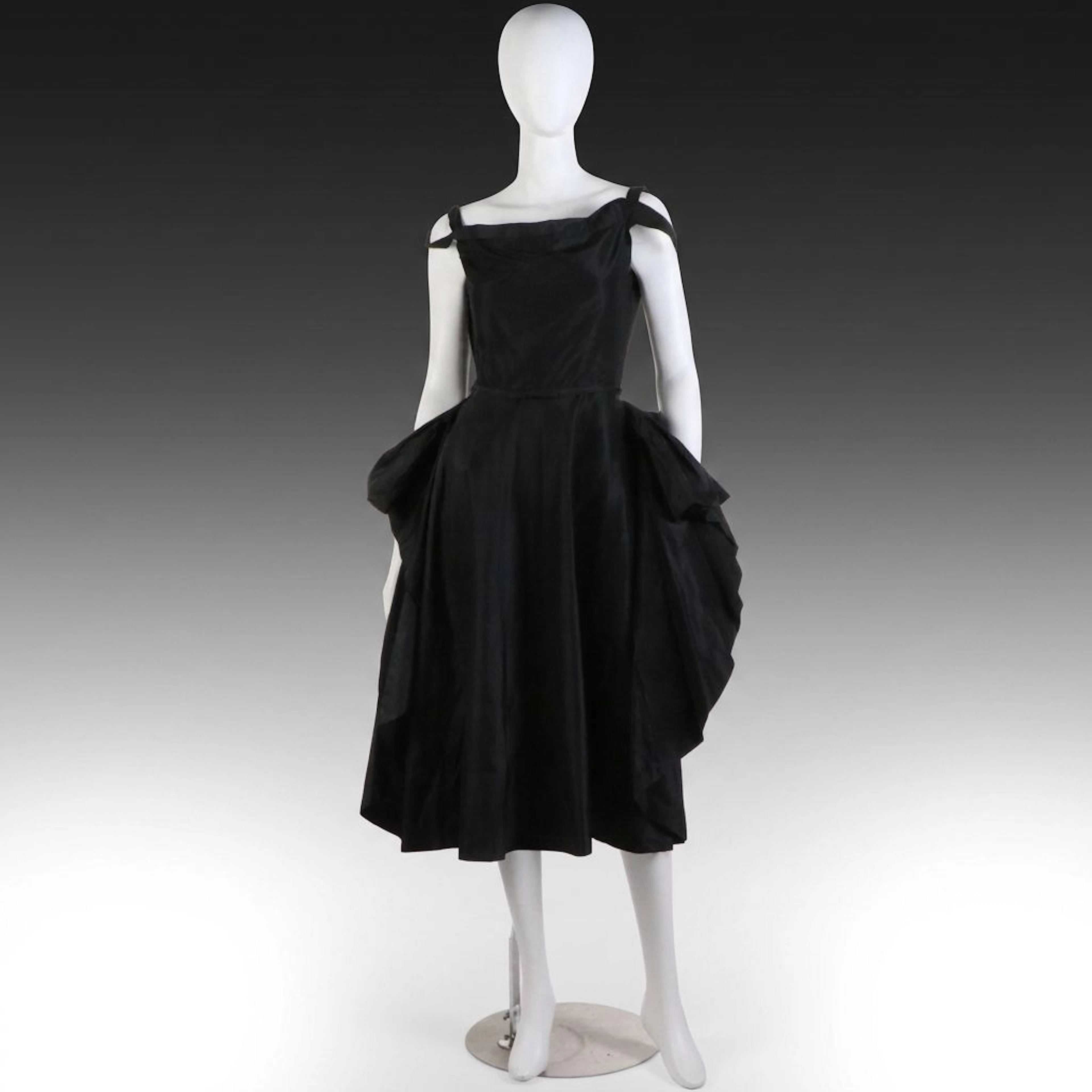 1950s Ceil Chapman Winged Hip Drape Cocktail Dress in Black Silk Taffeta