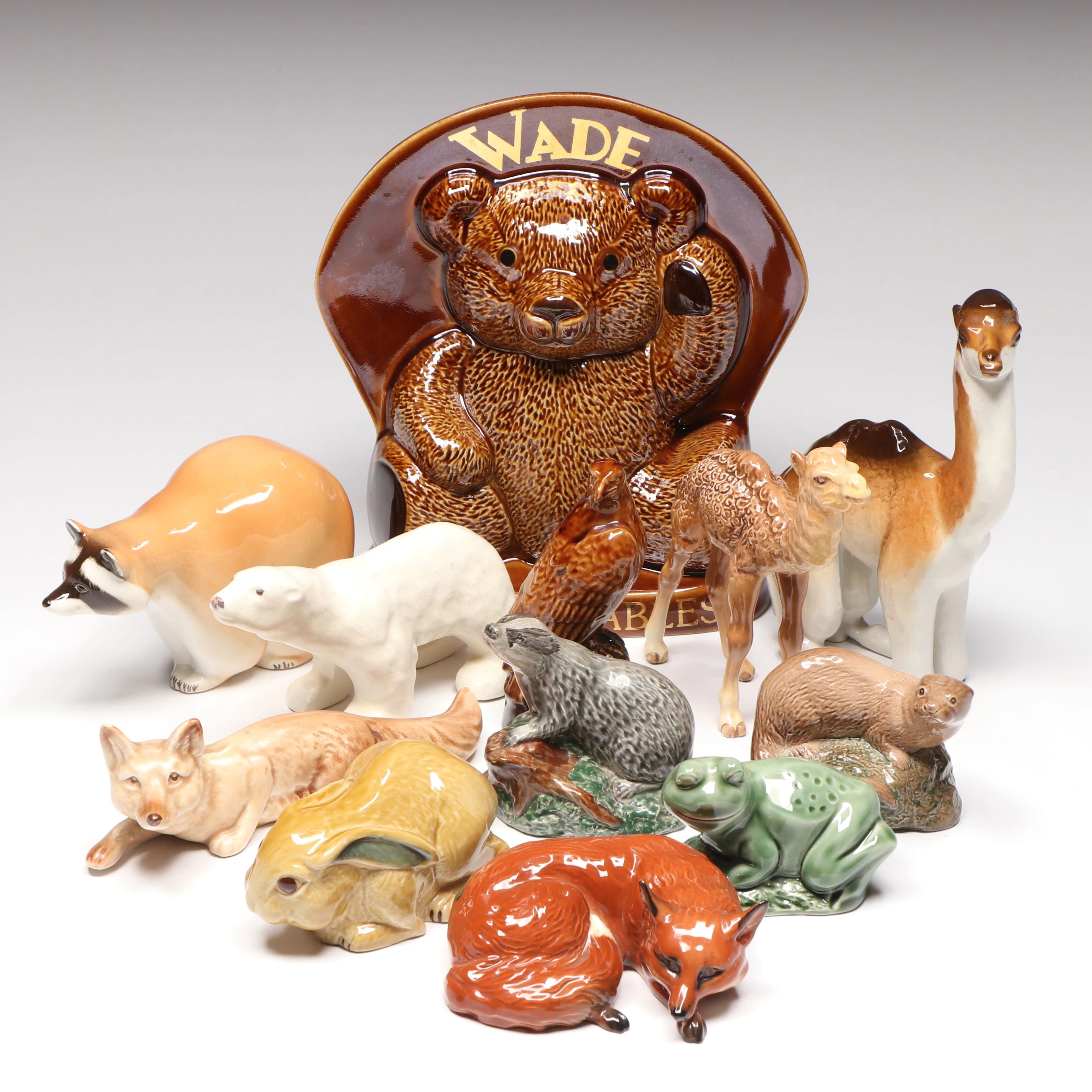 Lomonosov Porcelain Raccoon with Beswick Decanters and More Figurines