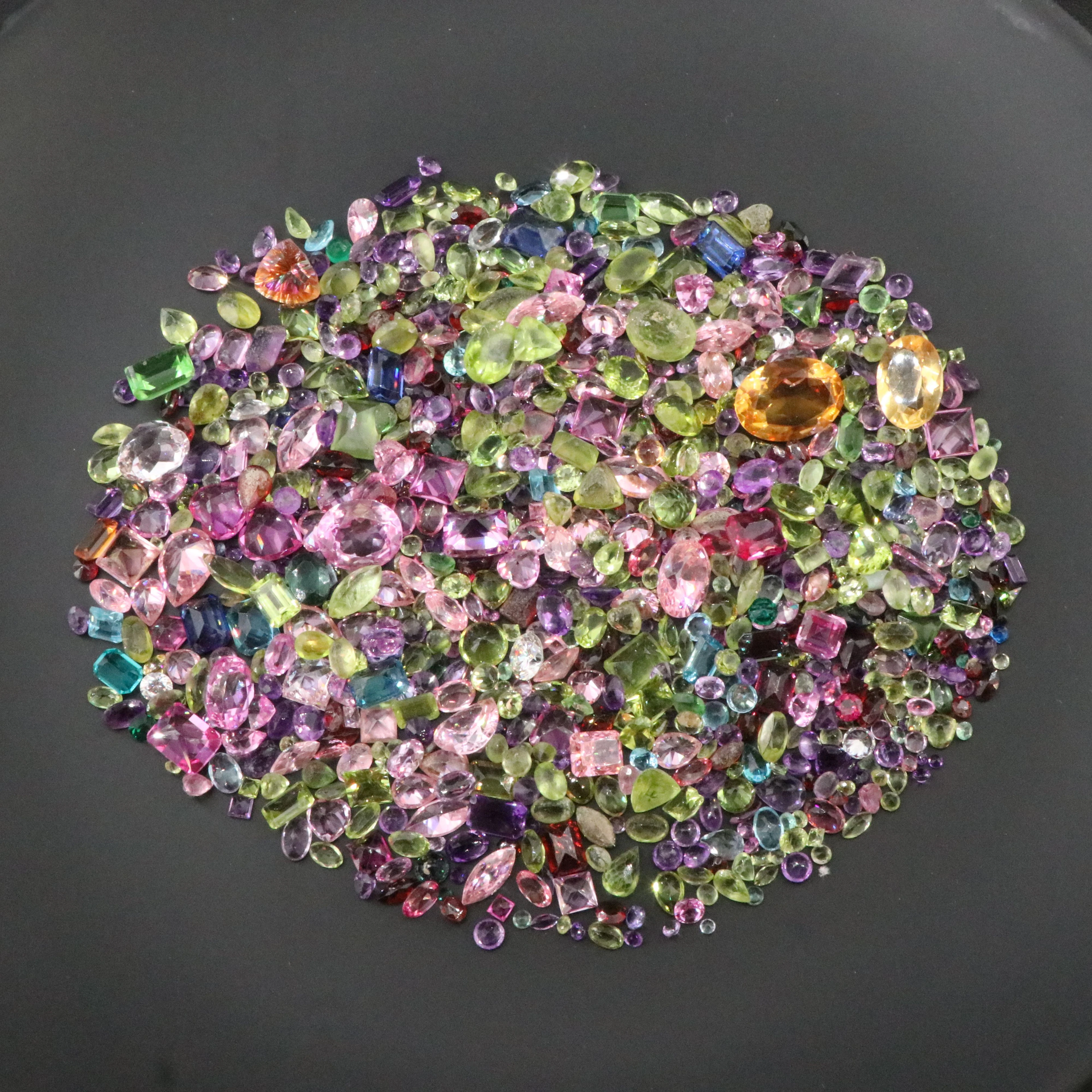 Loose 423.50 CTW Gemstones Featuring Amethyst, Peridot and Lab Grown Sapphire
