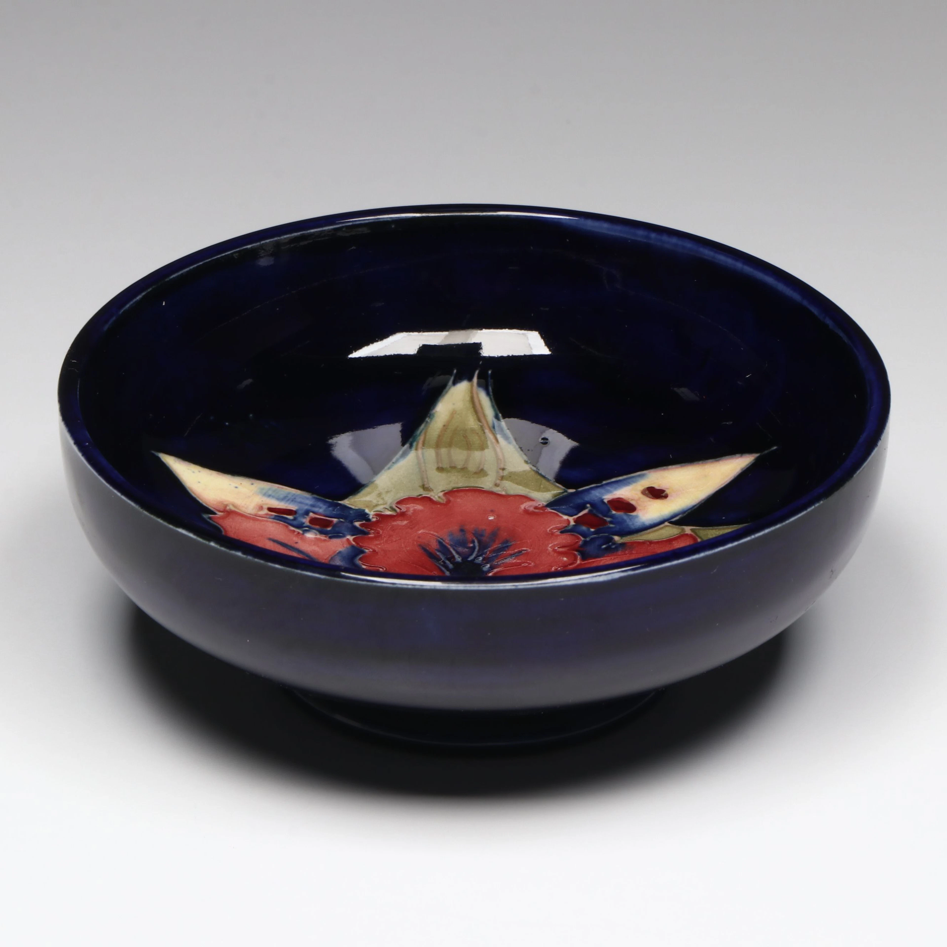 Moorcroft "Orchid" Cobalt Glazed Ceramic Footed Bowl
