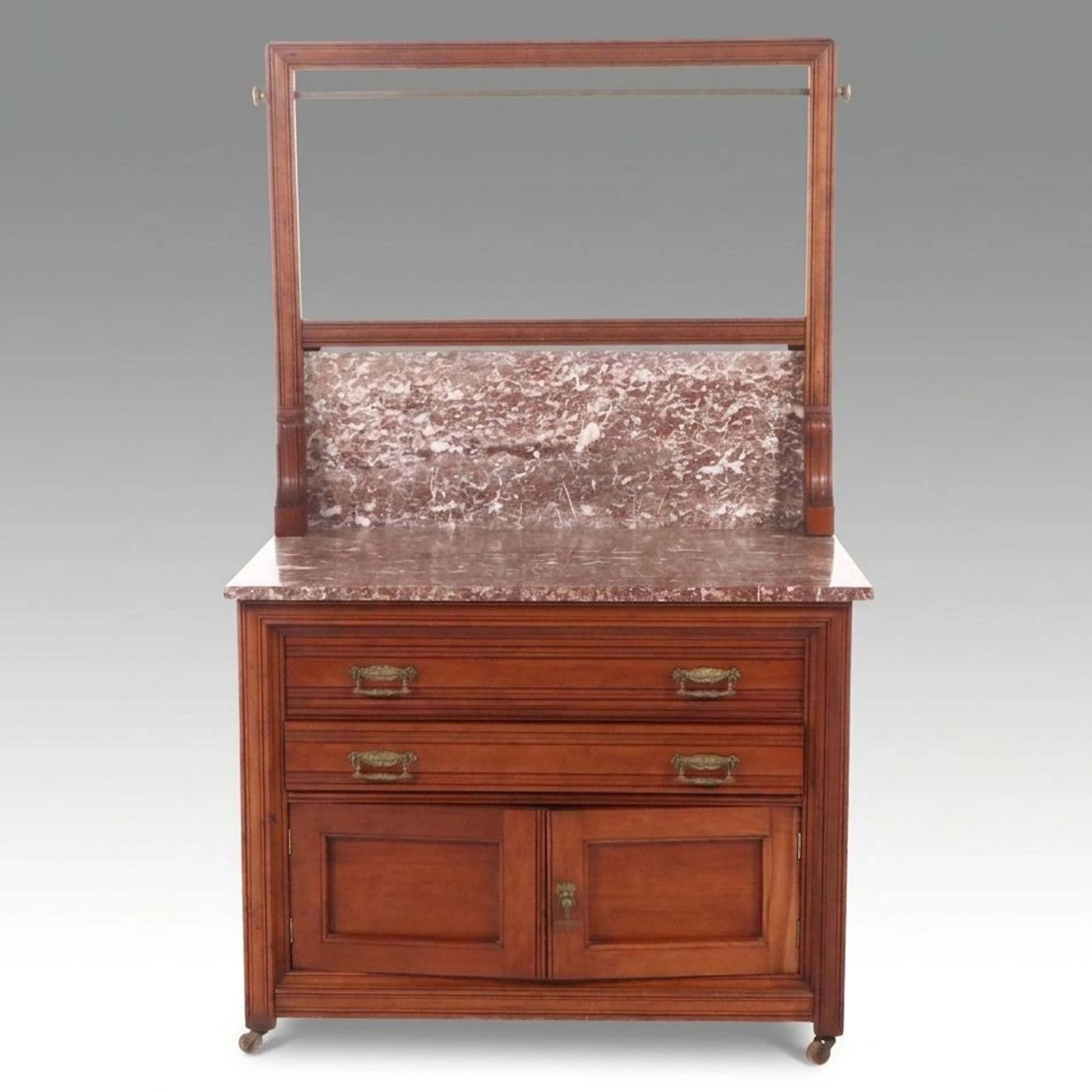 Robert Mitchell Furniture Co. Eastlake Style Carved Walnut Marble-Top Washstand