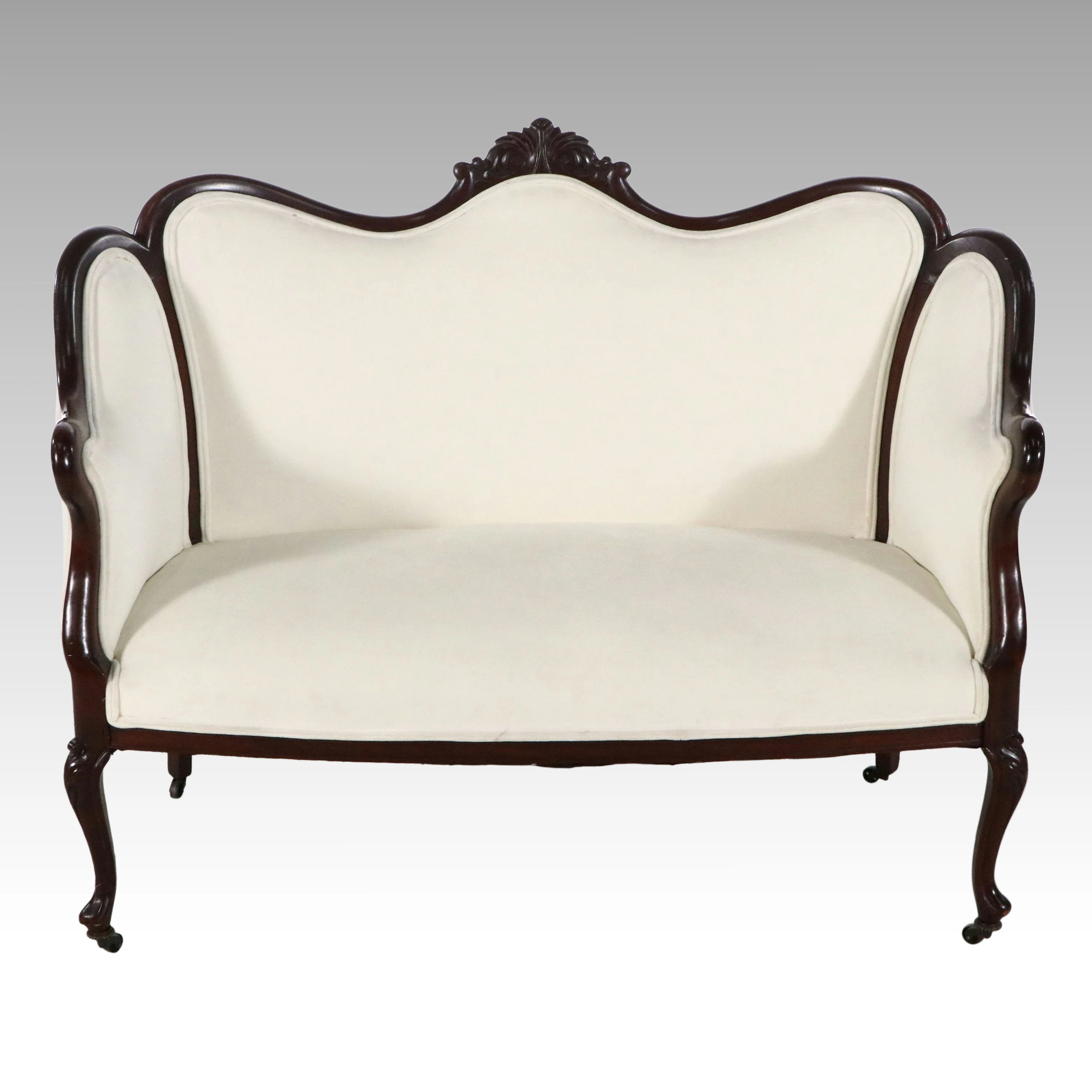 Victorian Style Carved Mahogany Loveseat with Cream Upholstery, 20th Century