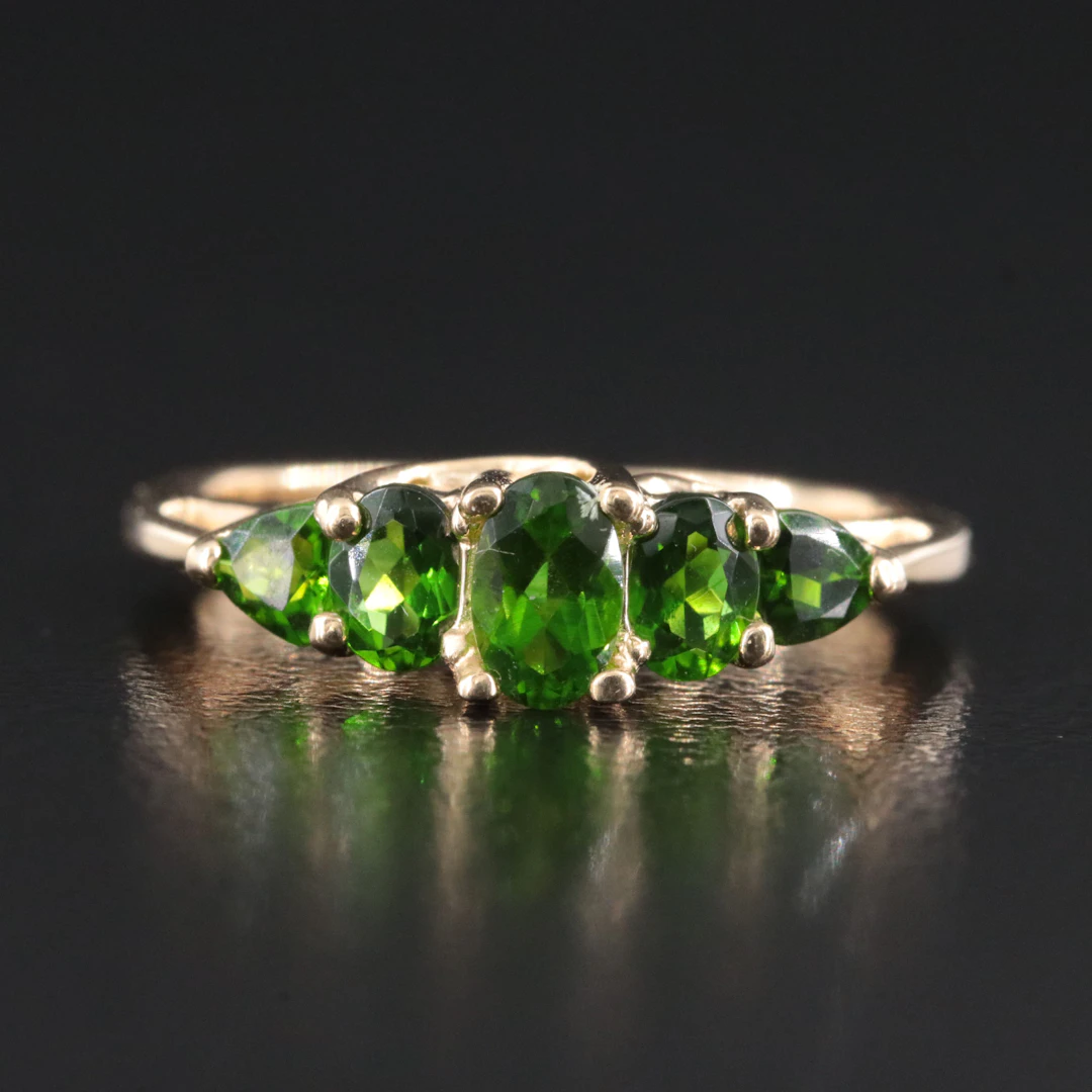 14K Peridot Ring with a Cathedral Setting
