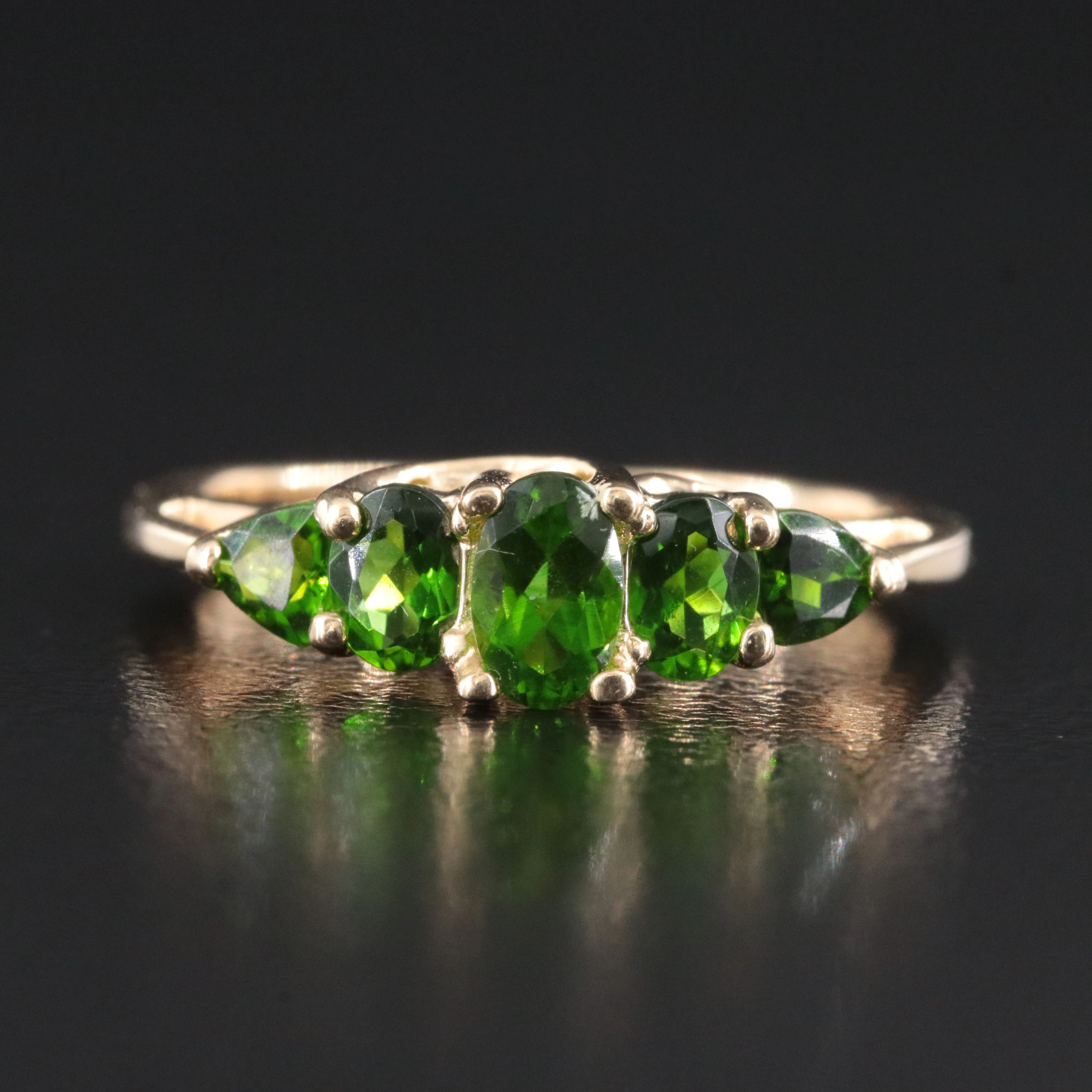 14K Peridot Ring with a Cathedral Setting