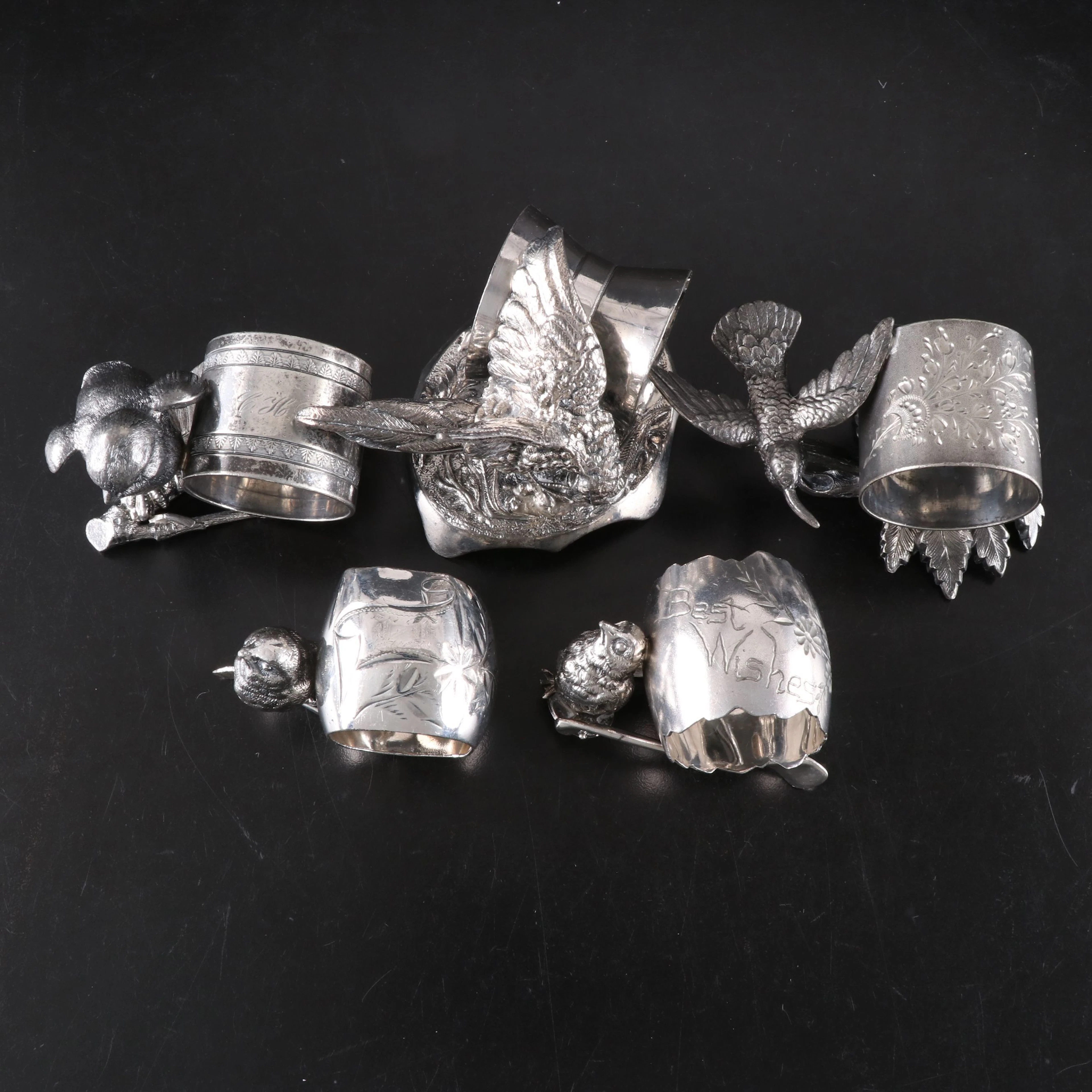 Derby and Other Victorian Silver Plate Figural Napkin Rings