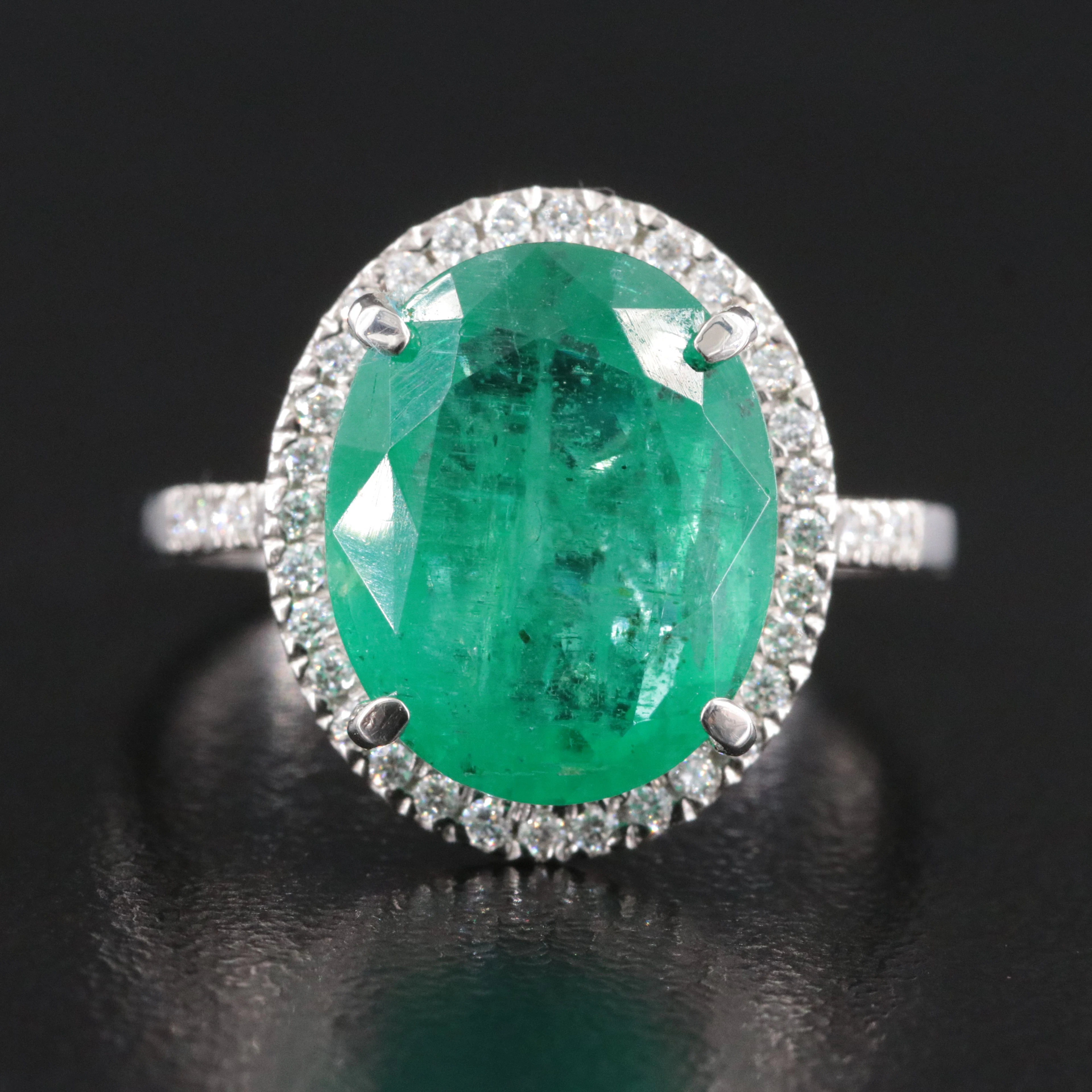 Platinum 5.17 CT Emerald and Diamond Halo Ring