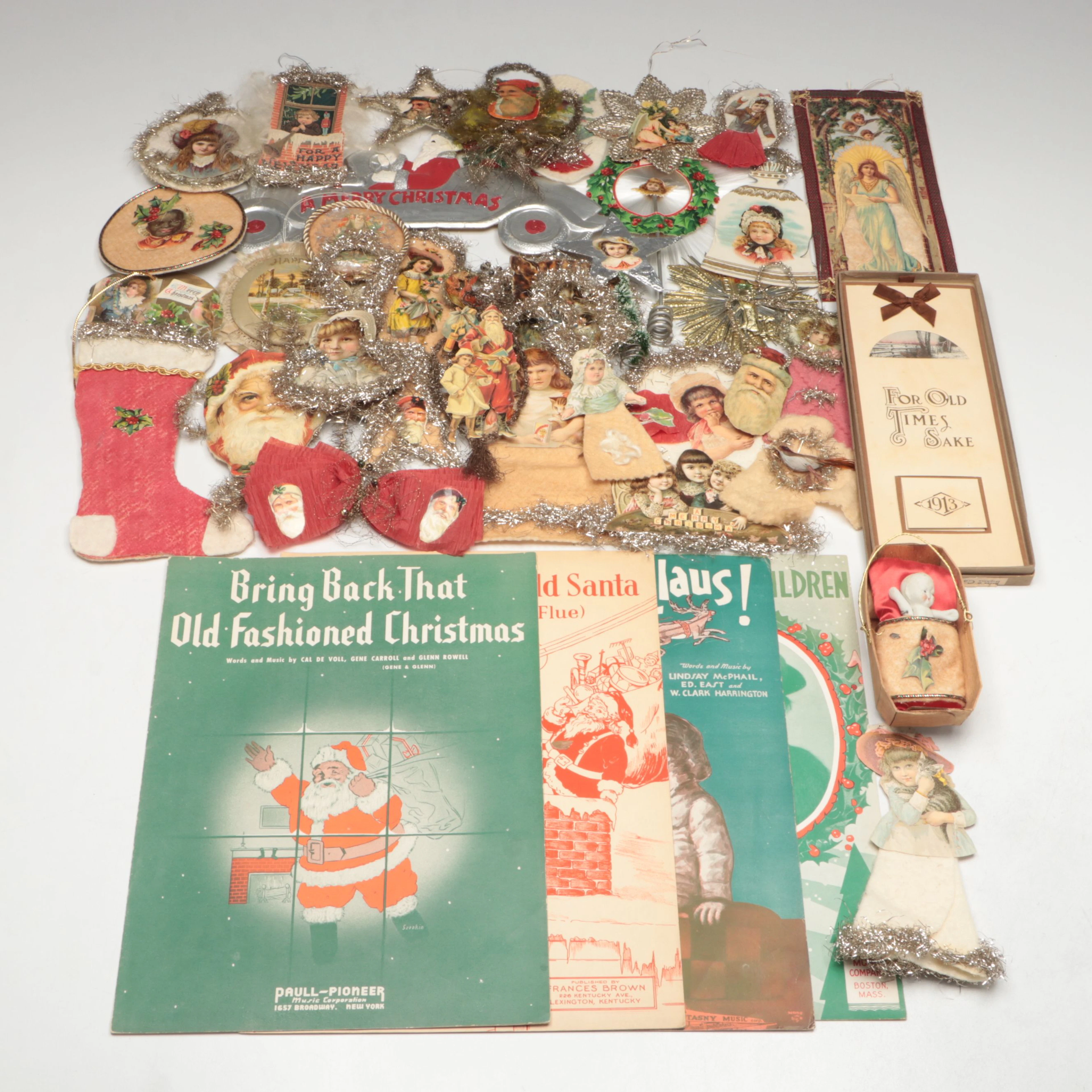 Handcrafted Chromolithograph Ornaments with Seasonal Décor and Ephemera