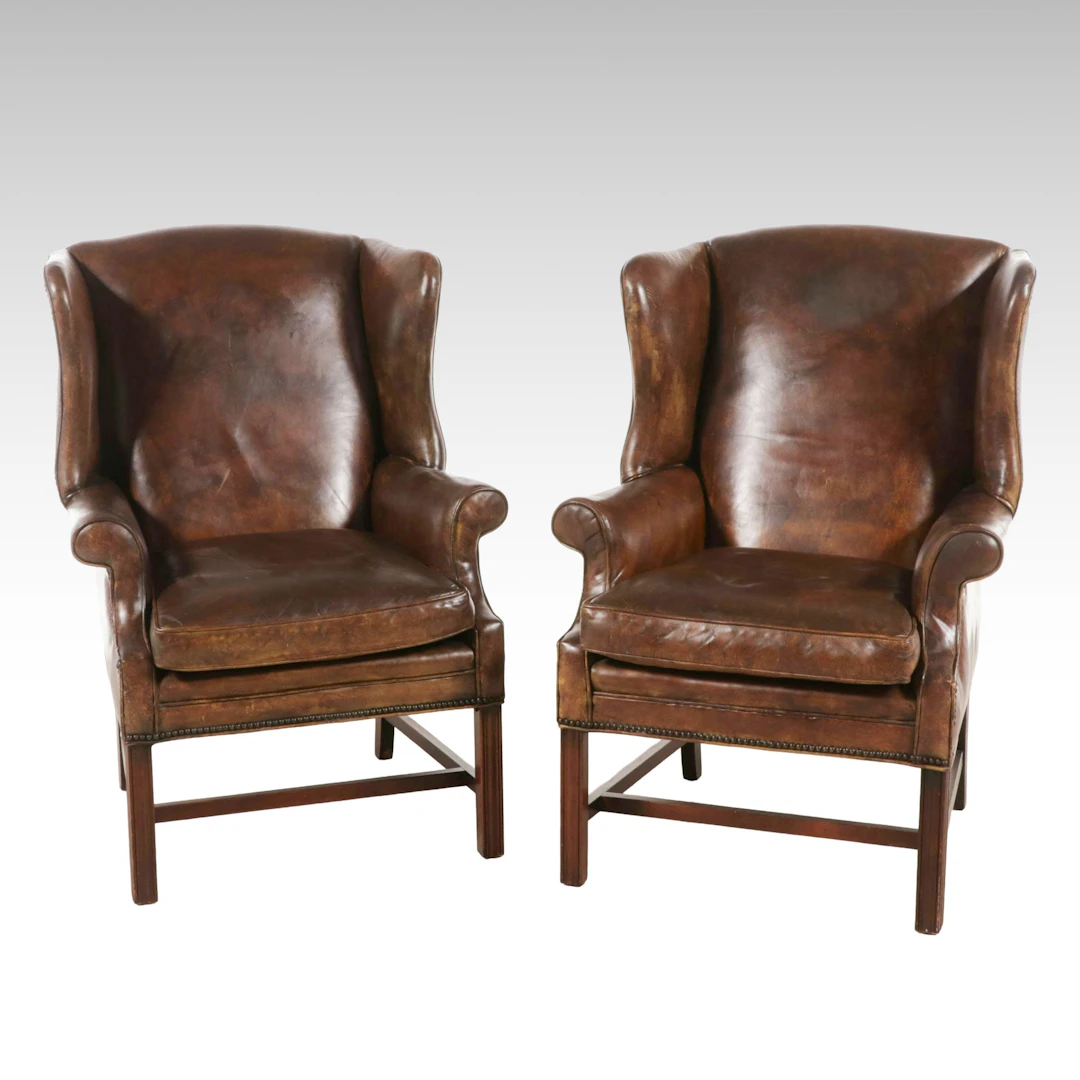 Pair of Leather Chippendale Style Wingback Chairs