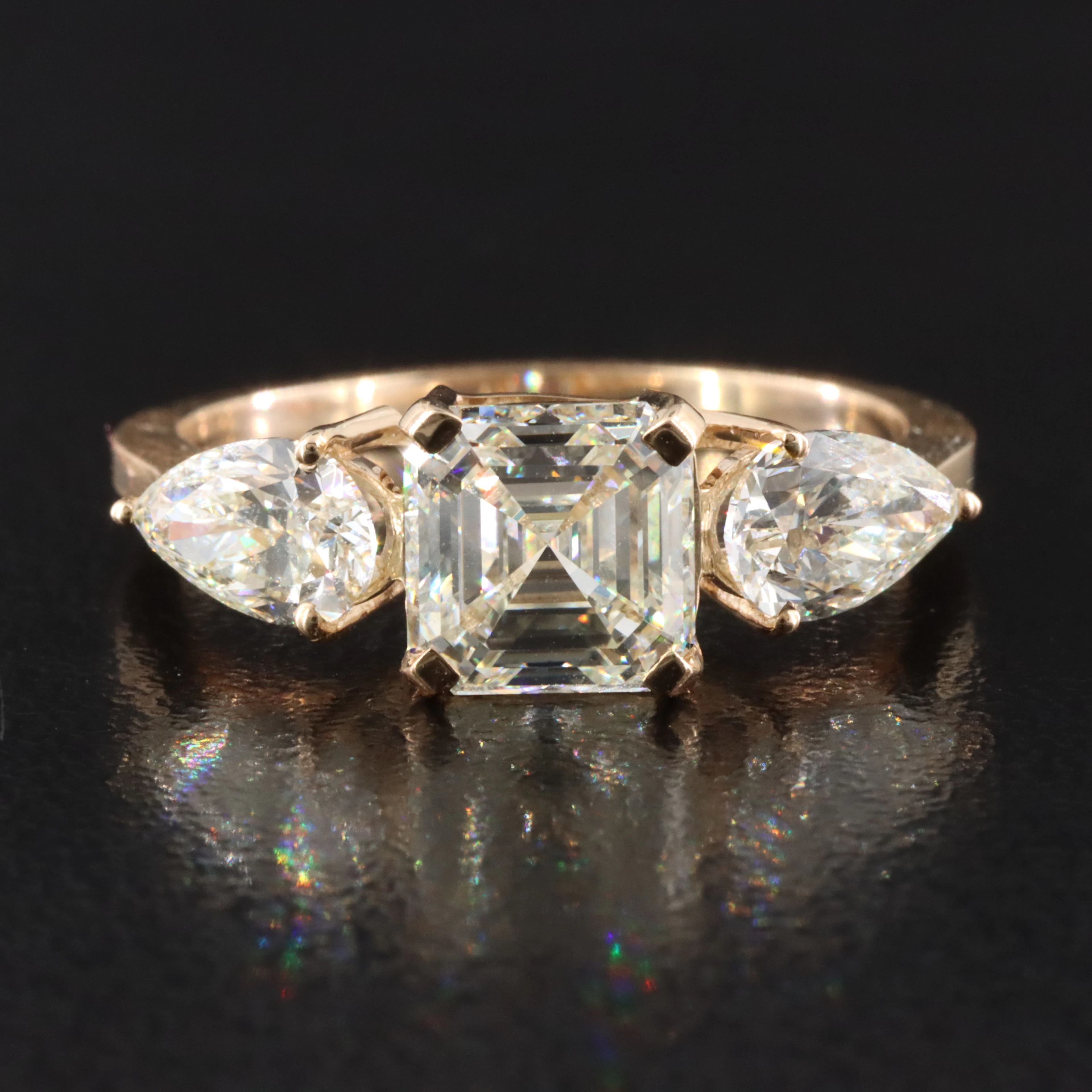 14K 2.61 CTW Diamond Three Stone Ring Featuring Internally Flawless