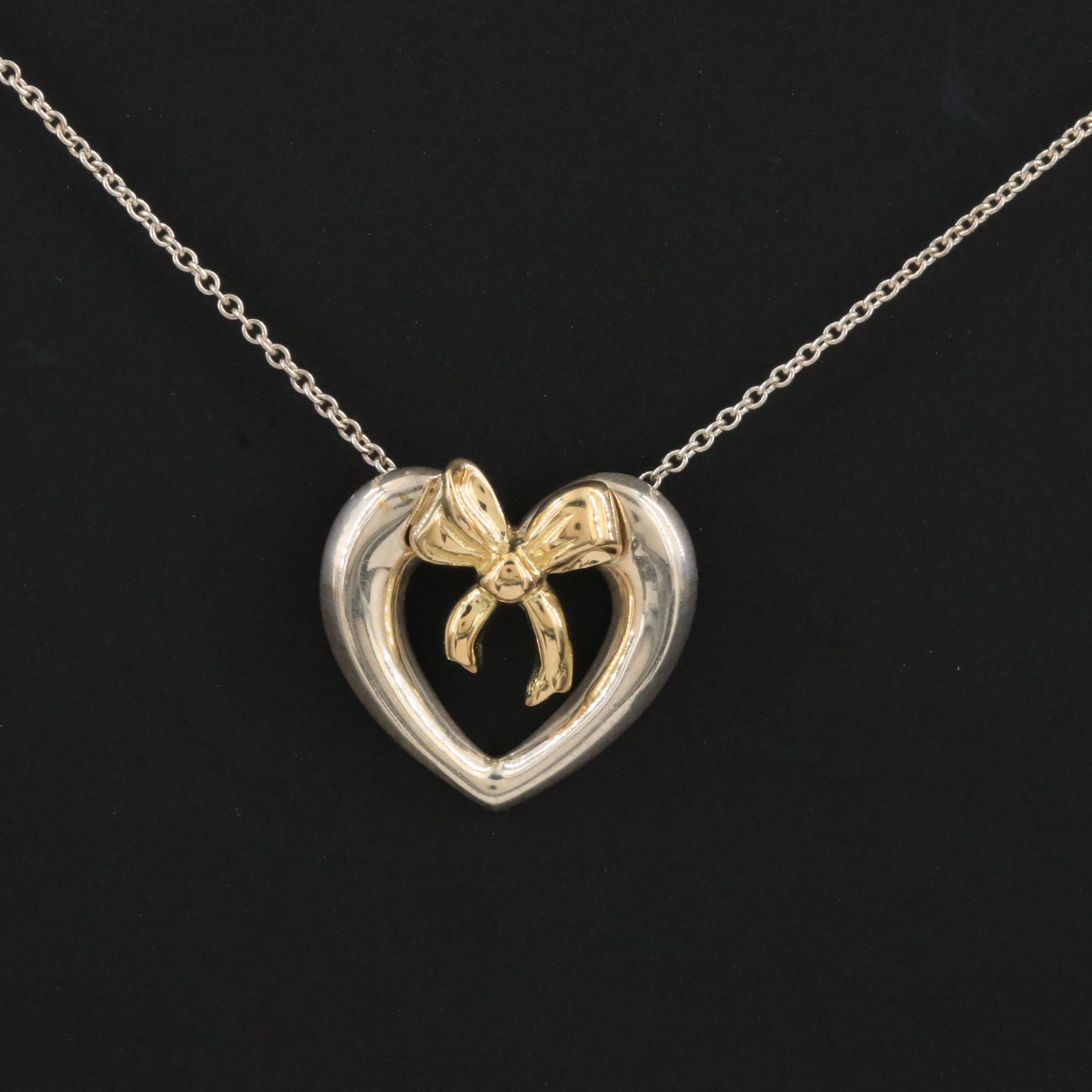 Tiffany & Co. Sterling and 18K Bow Heart Necklace