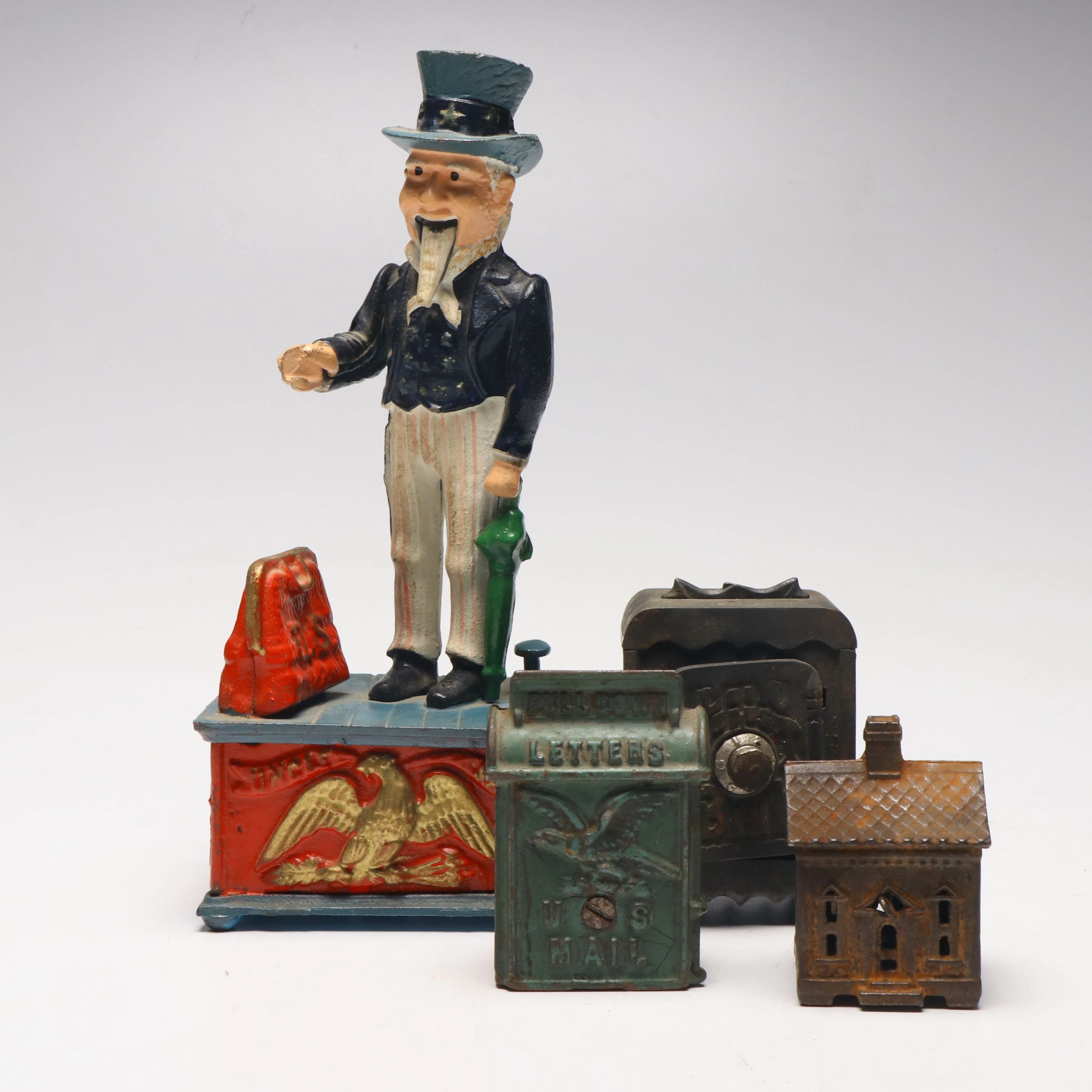 Uncle Sam Reproduction and More Cast Iron Coin Banks, Vintage