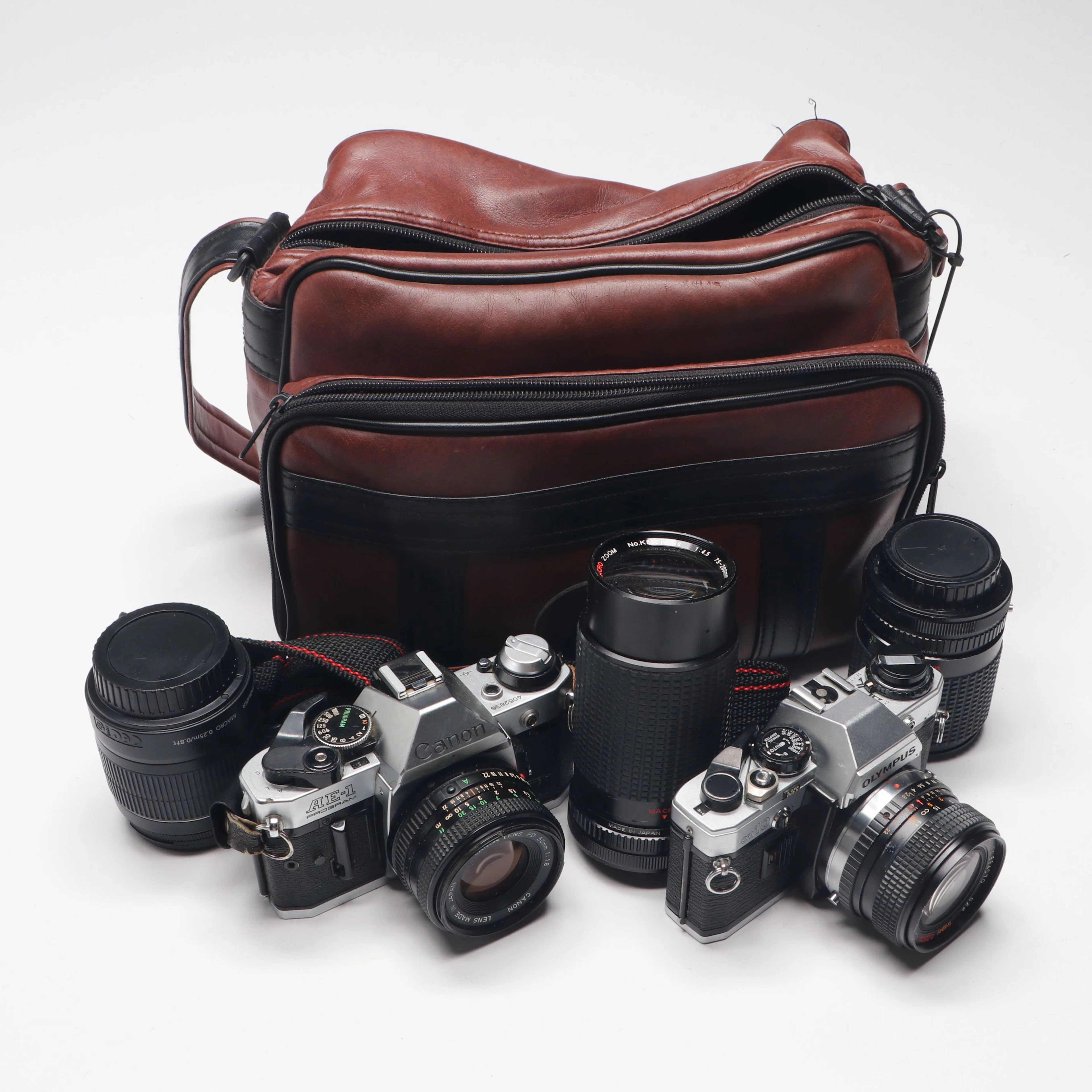 Canon AE-1 and Olympus OM 10 Cameras with More Cameras Accessories, Vintage