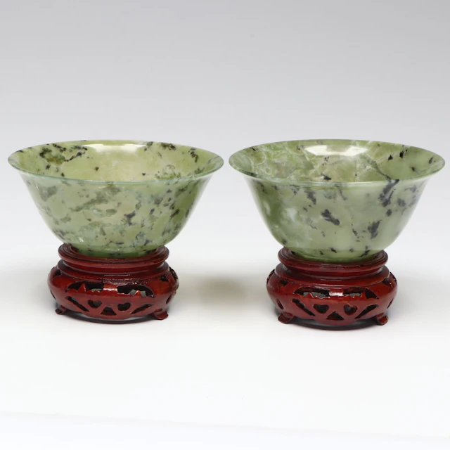 Pair of Chinese Carved Serpentine Bowls on Wooden Stands