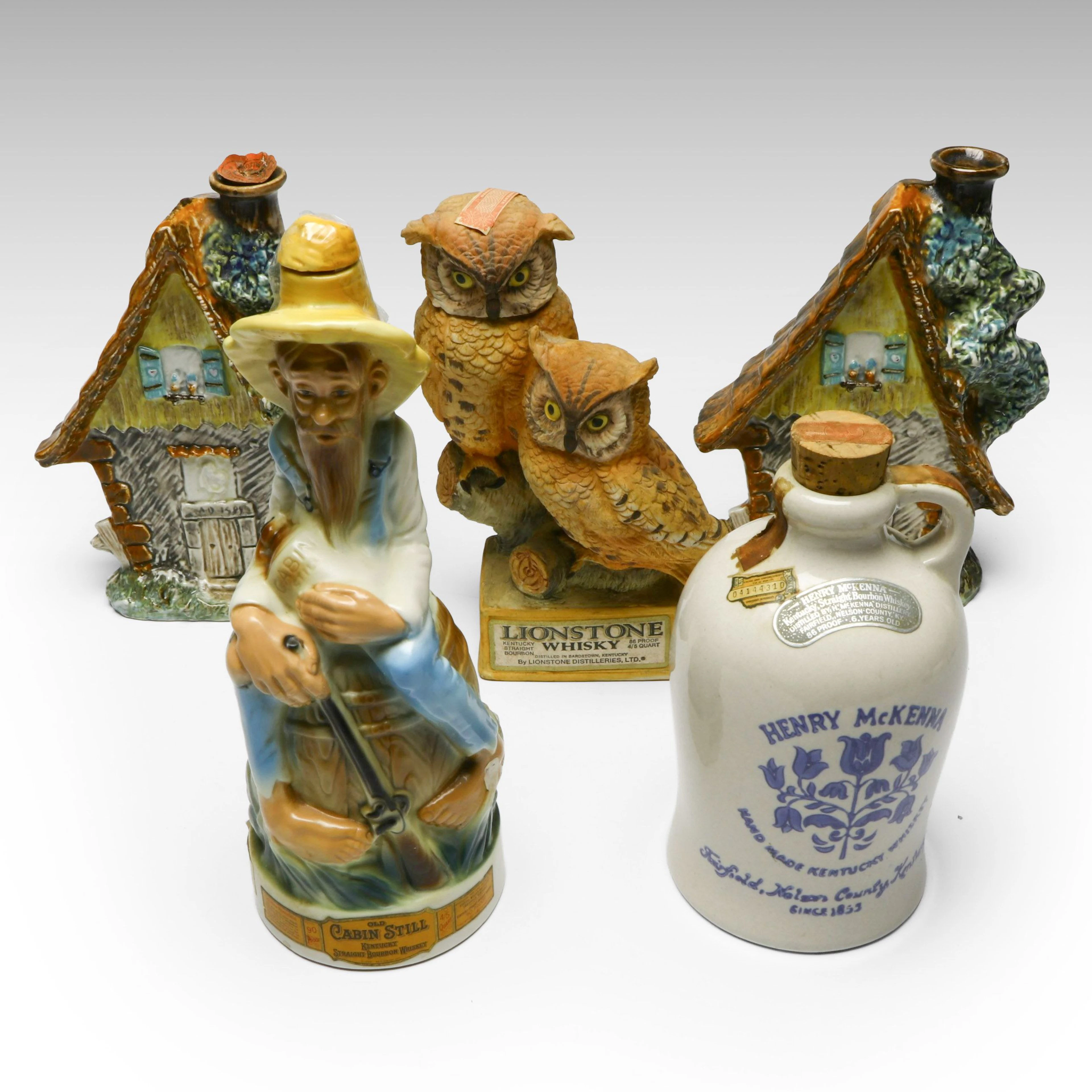 Old Cabin Still Figural Decanter with Other Wine and Spirit Decanters, Vintage