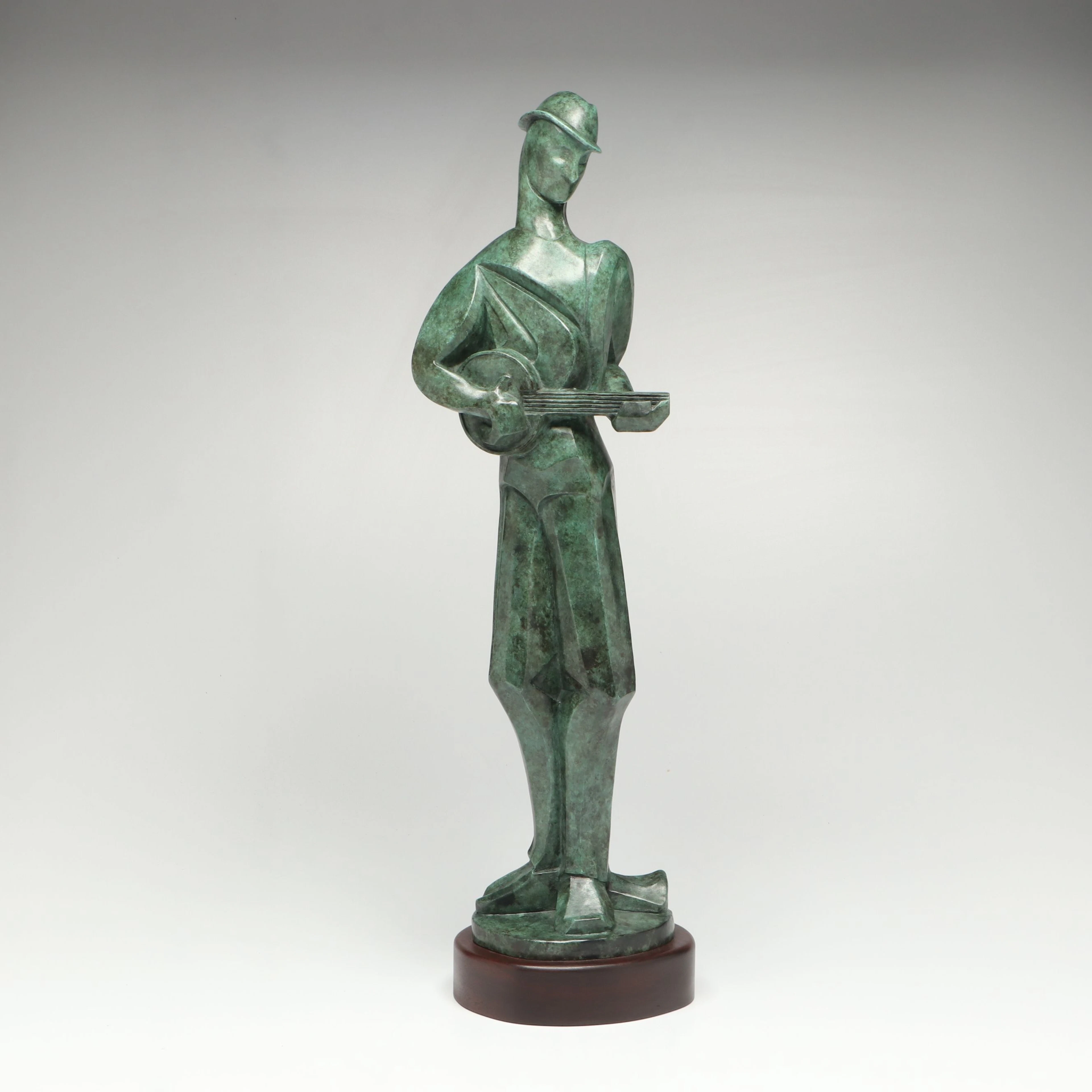 Eastern European Cubist Style Patina Finished Musician Figurine on Wooden Base